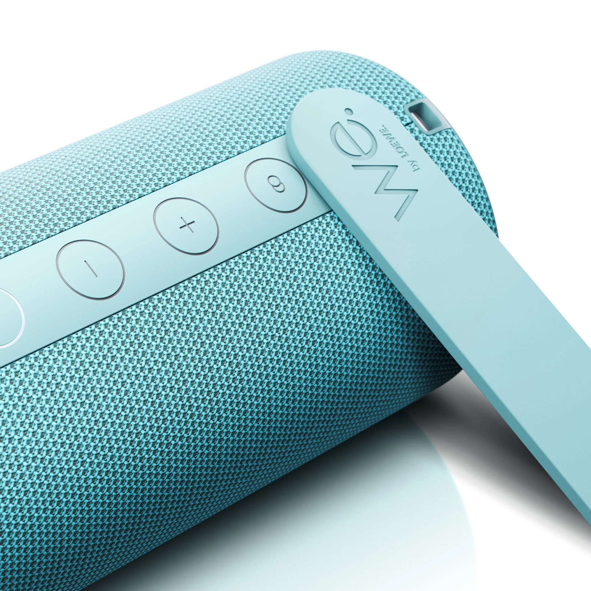 Düğmeler ve logolu, teal renkli Bluetooth hoparlör.