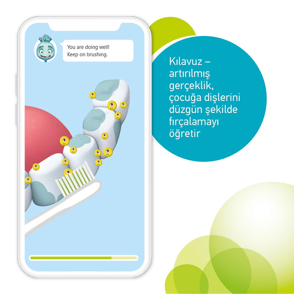 Uygulama, küçük sarı yüzlü dişleri ve diş fırçasını gösteriyor. Metin: Fırçalamaya devam et.
