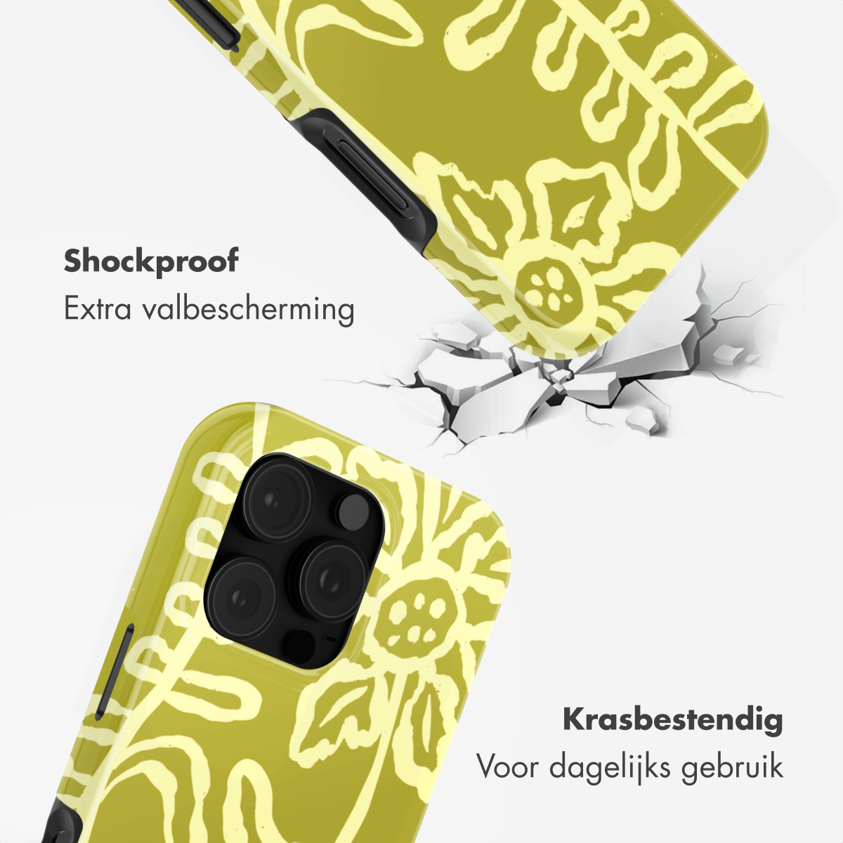 Geel telefoonhoesje met bloemenpatroon dat op gebarsten grond valt.