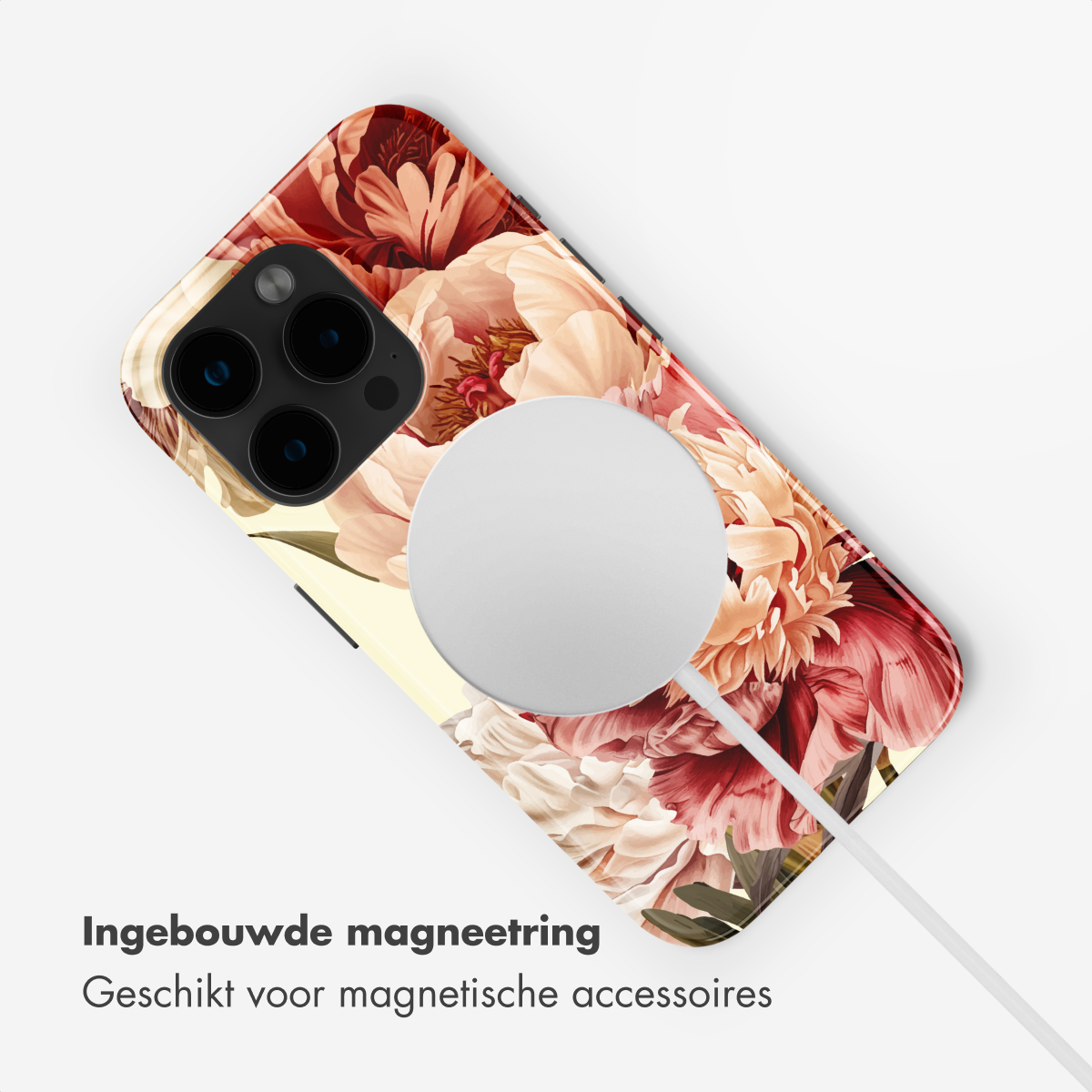 Retro di uno smartphone con motivo floreale, anello magnetico bianco e cavo.