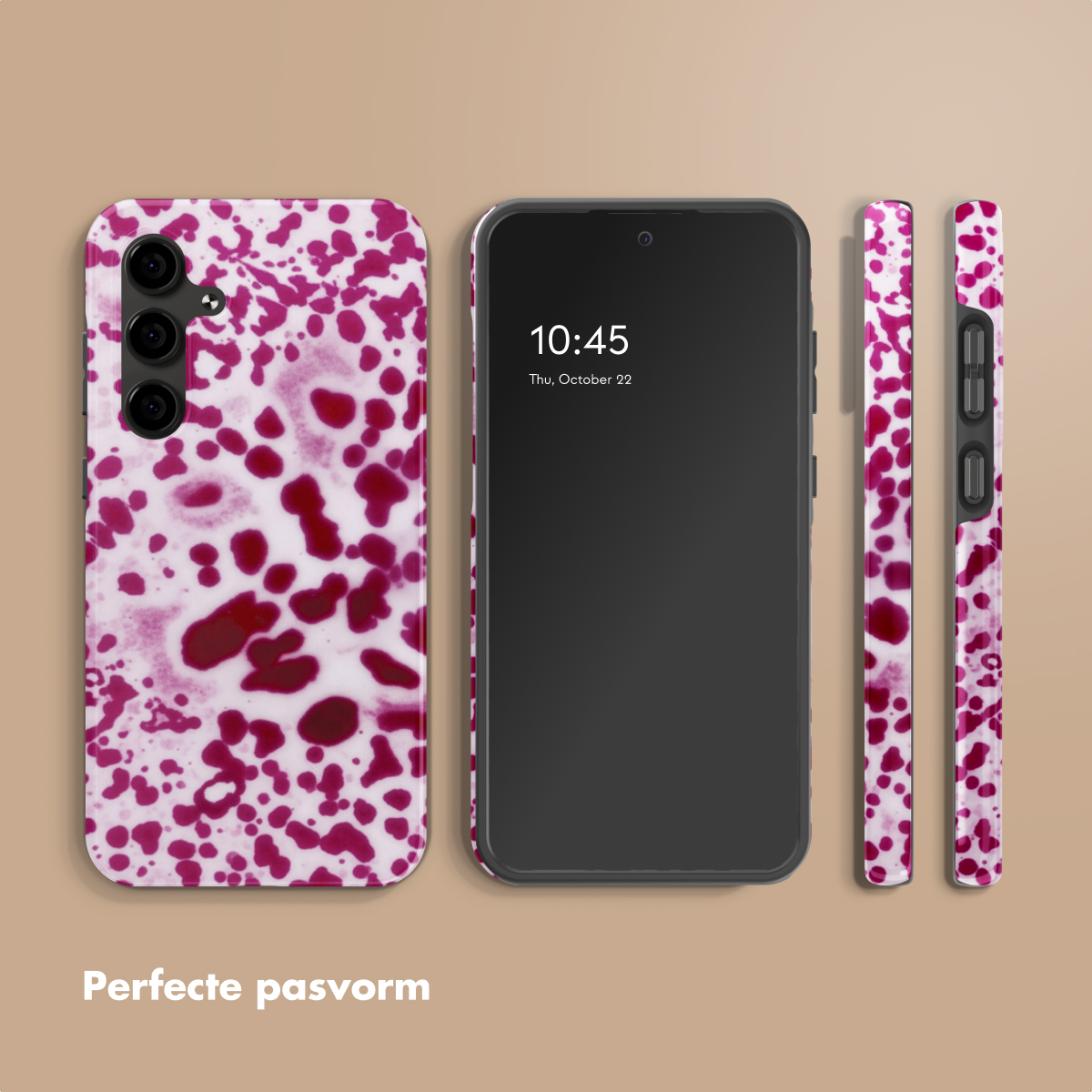 Una custodia per telefono con un motivo a macchie rosse e bianche accanto a uno smartphone.