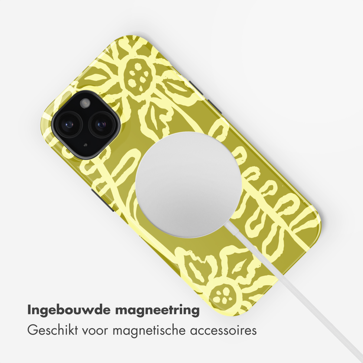 A yellow phone case with a floral pattern and a magnetic charging plate.
