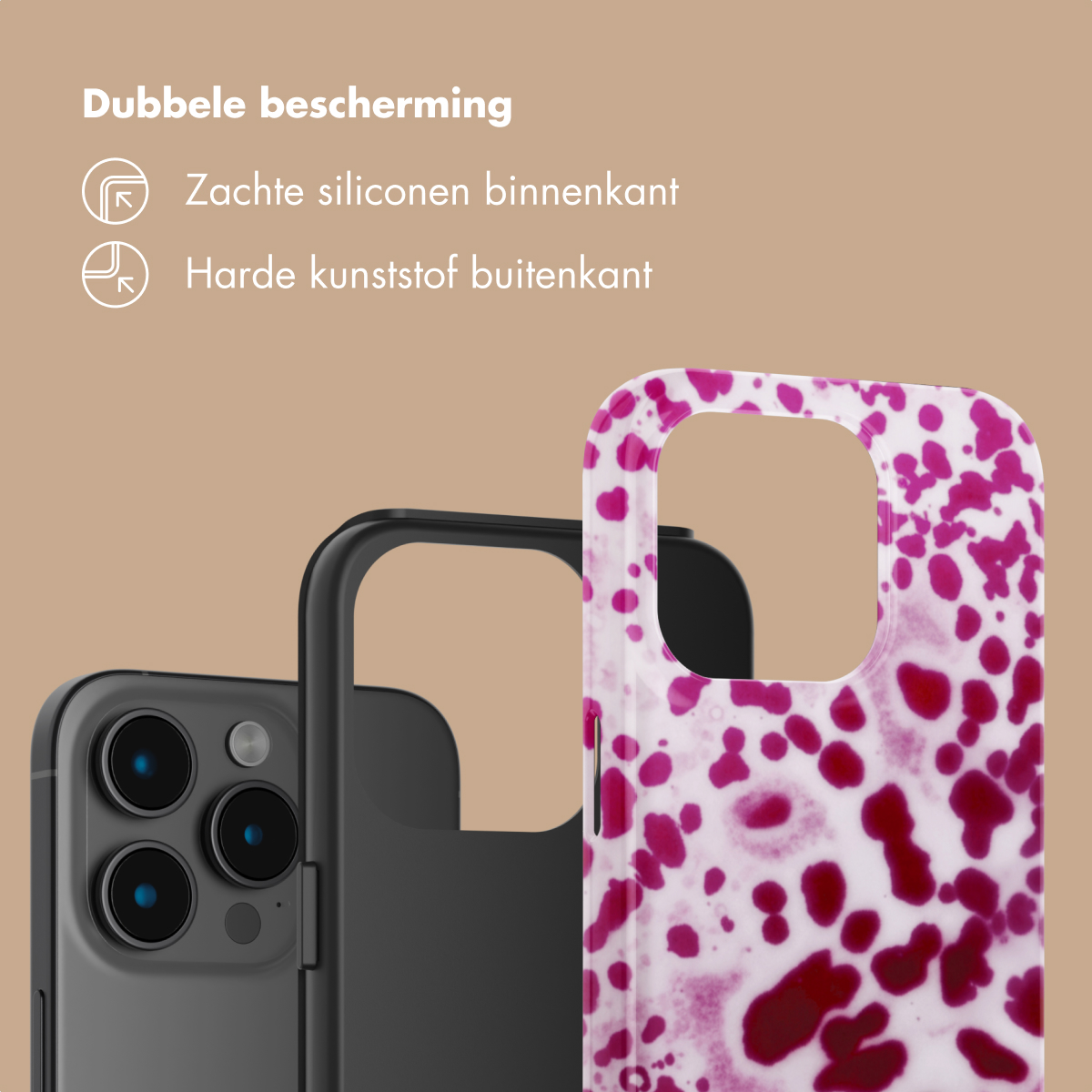 Un telefono scuro accanto a una custodia per telefono a macchie rosa.