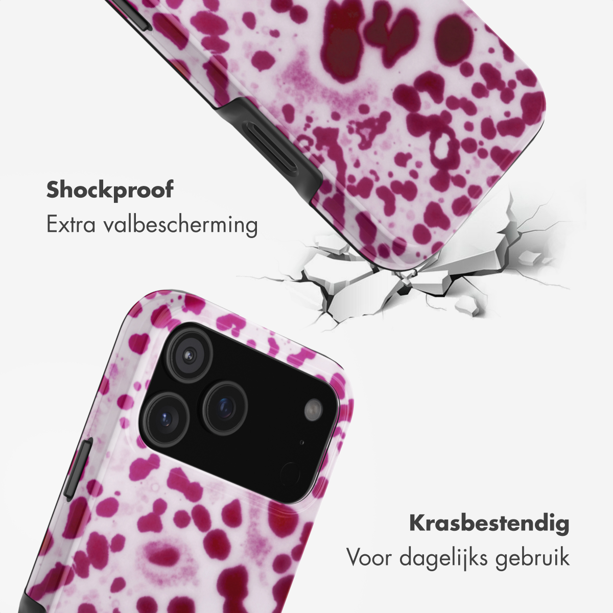 Schokbestendige telefoonhoes met roze vlekken breekt door grond.