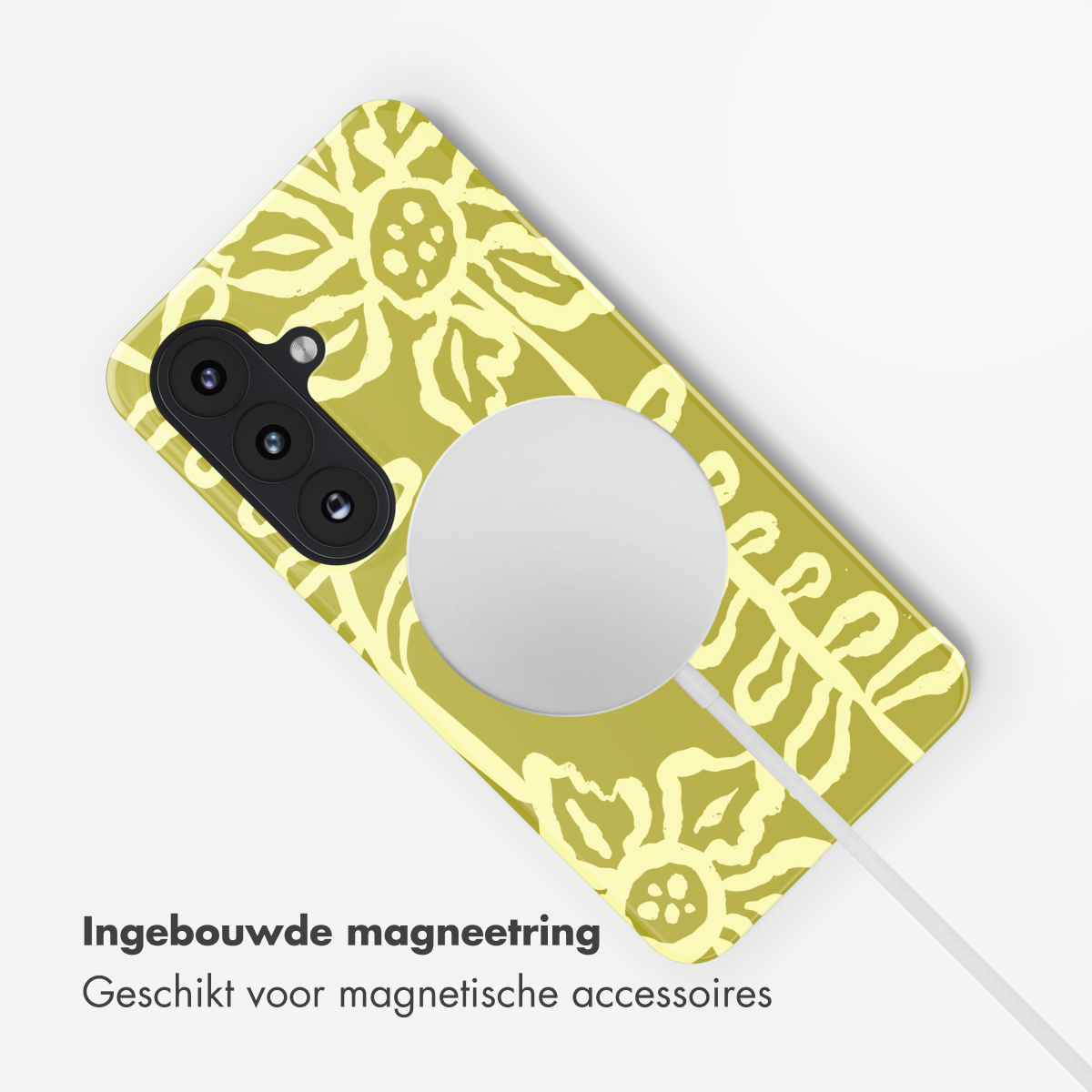 Een gele telefoonhoes met bloemenpatroon en een magnetische oplaadcirkel.