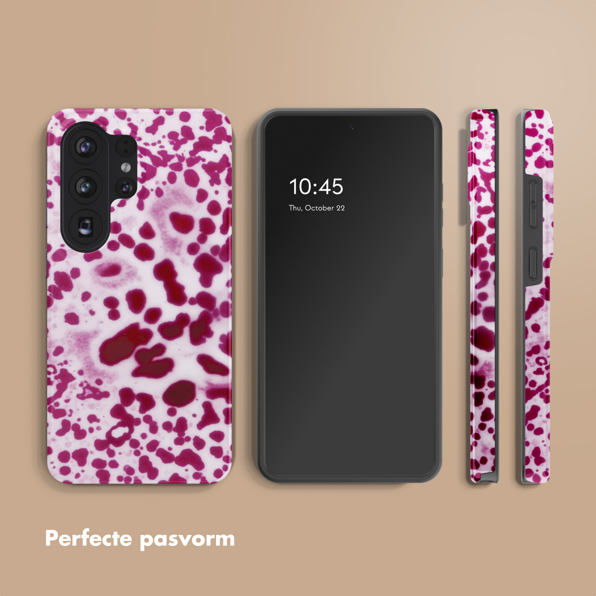 Un smartphone avec un étui à motifs de taches rouges sur fond blanc.