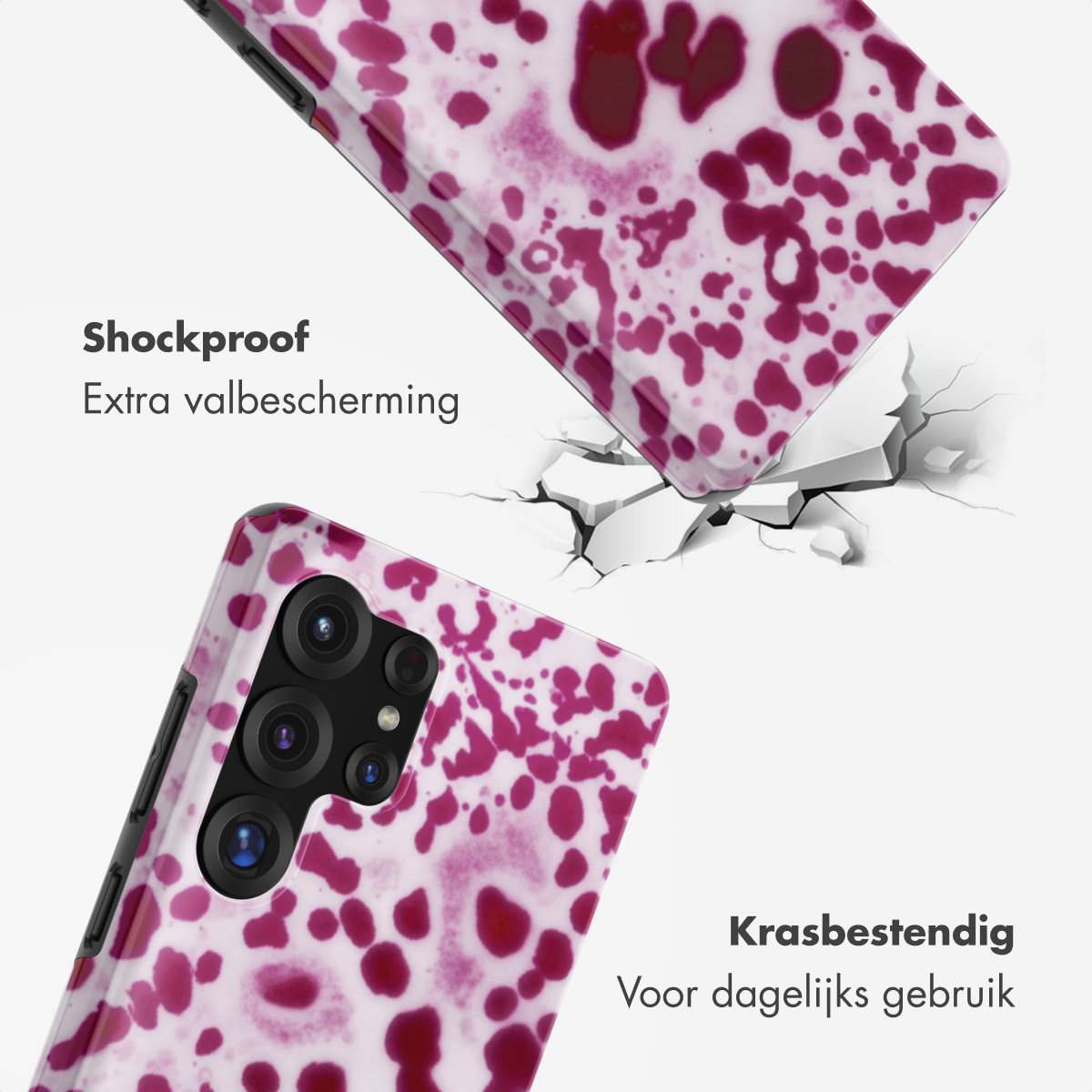 Twee telefoonhoesjes met paars-wit vlekkenpatroon, één valt.
