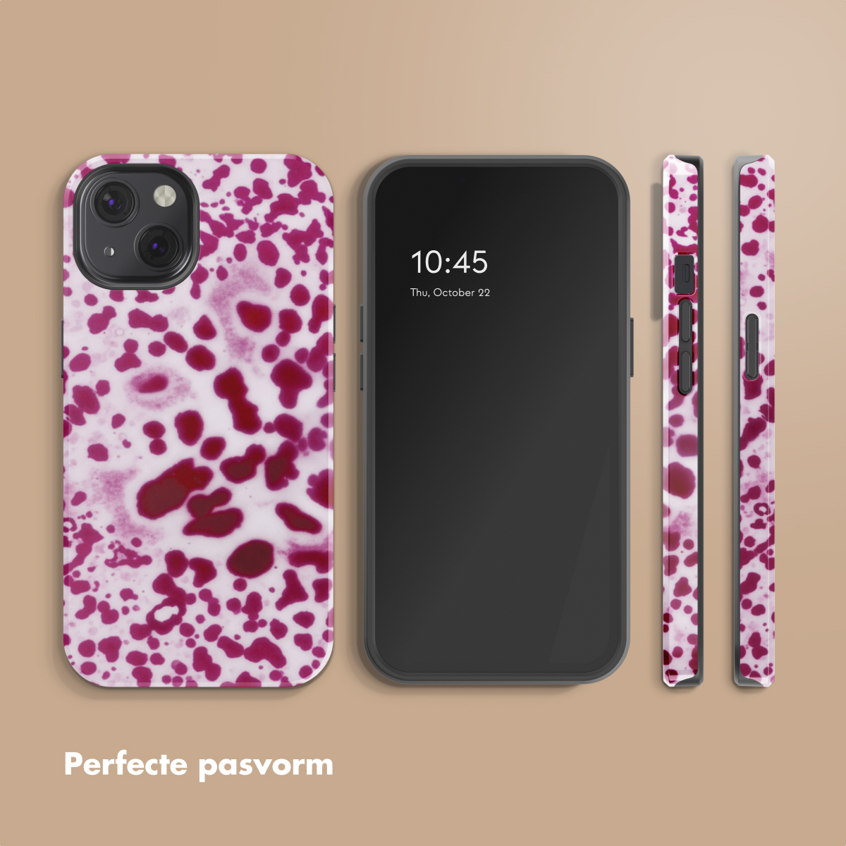 Uno smartphone con un motivo a macchie rosse su sfondo bianco.