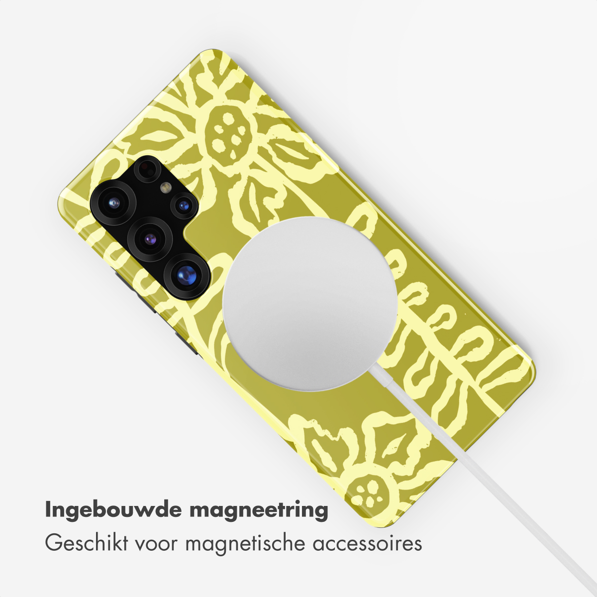Een smartphone met geel bloemenpatroon en een witte magneetring.