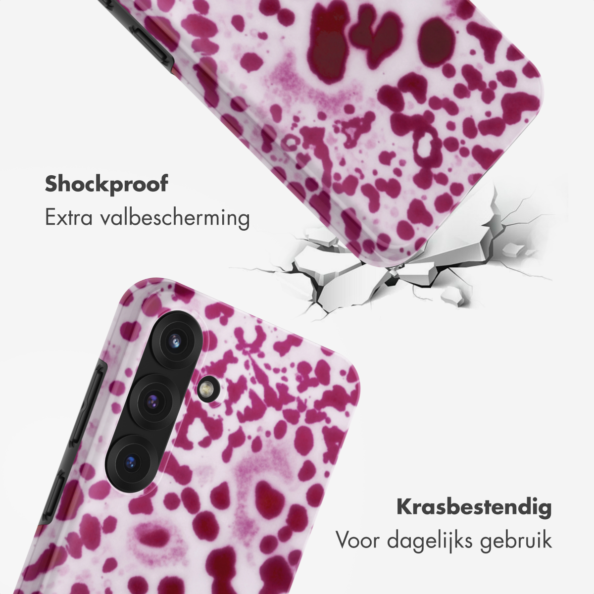 Een telefoonhoes met roze vlekkenpatroon breekt door een vloer.