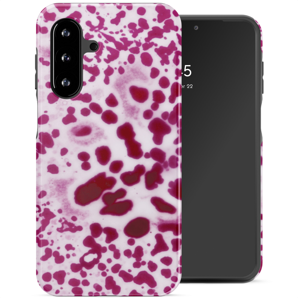Een smartphone met een hoesje met een rood vlekkenpatroon.