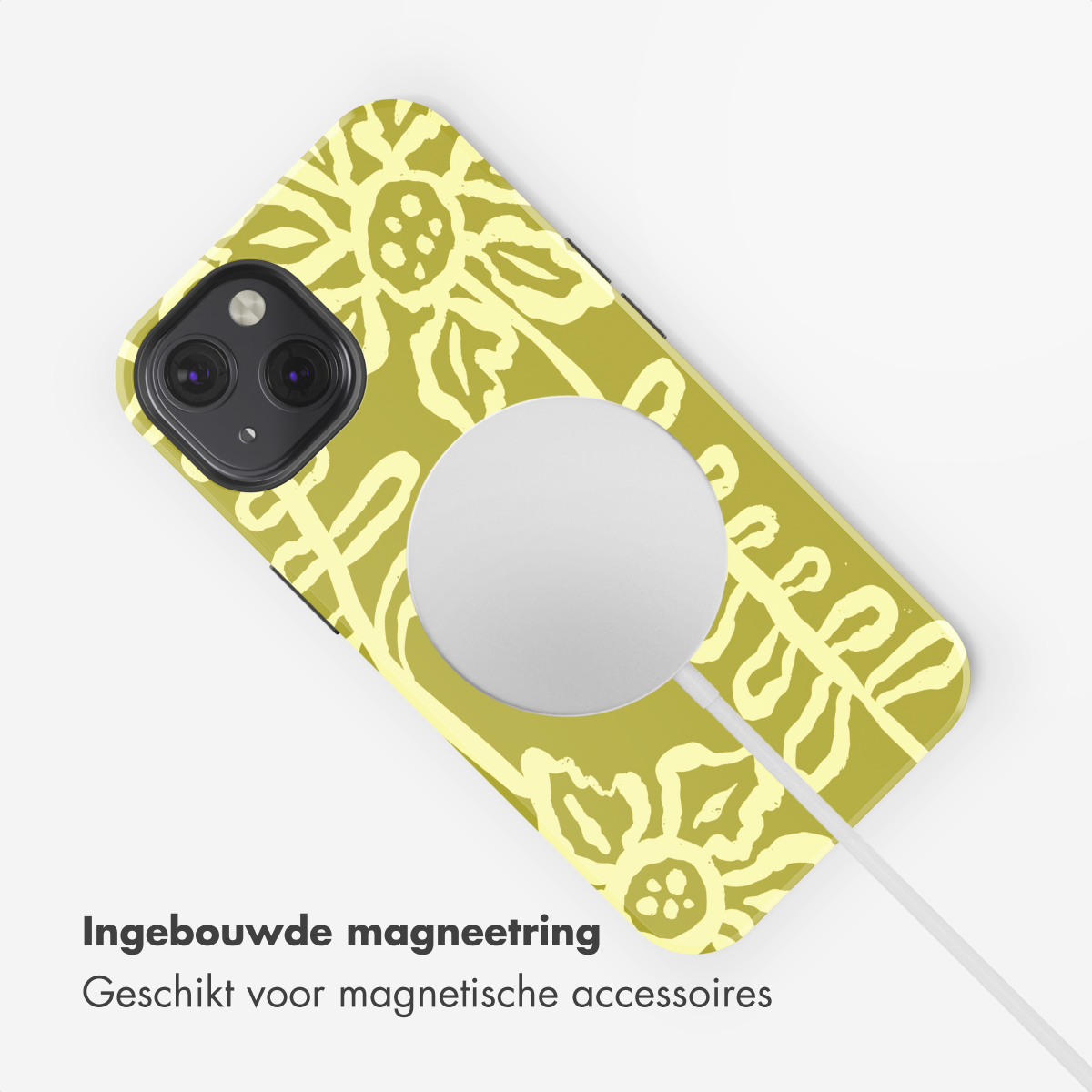 Una custodia gialla per iPhone con motivo floreale e anello MagSafe.