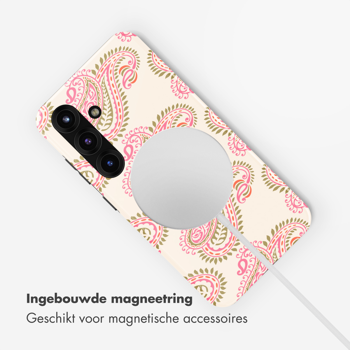 Een telefoonhoesje met roze en groen paisley-patroon en een witte cirkel.