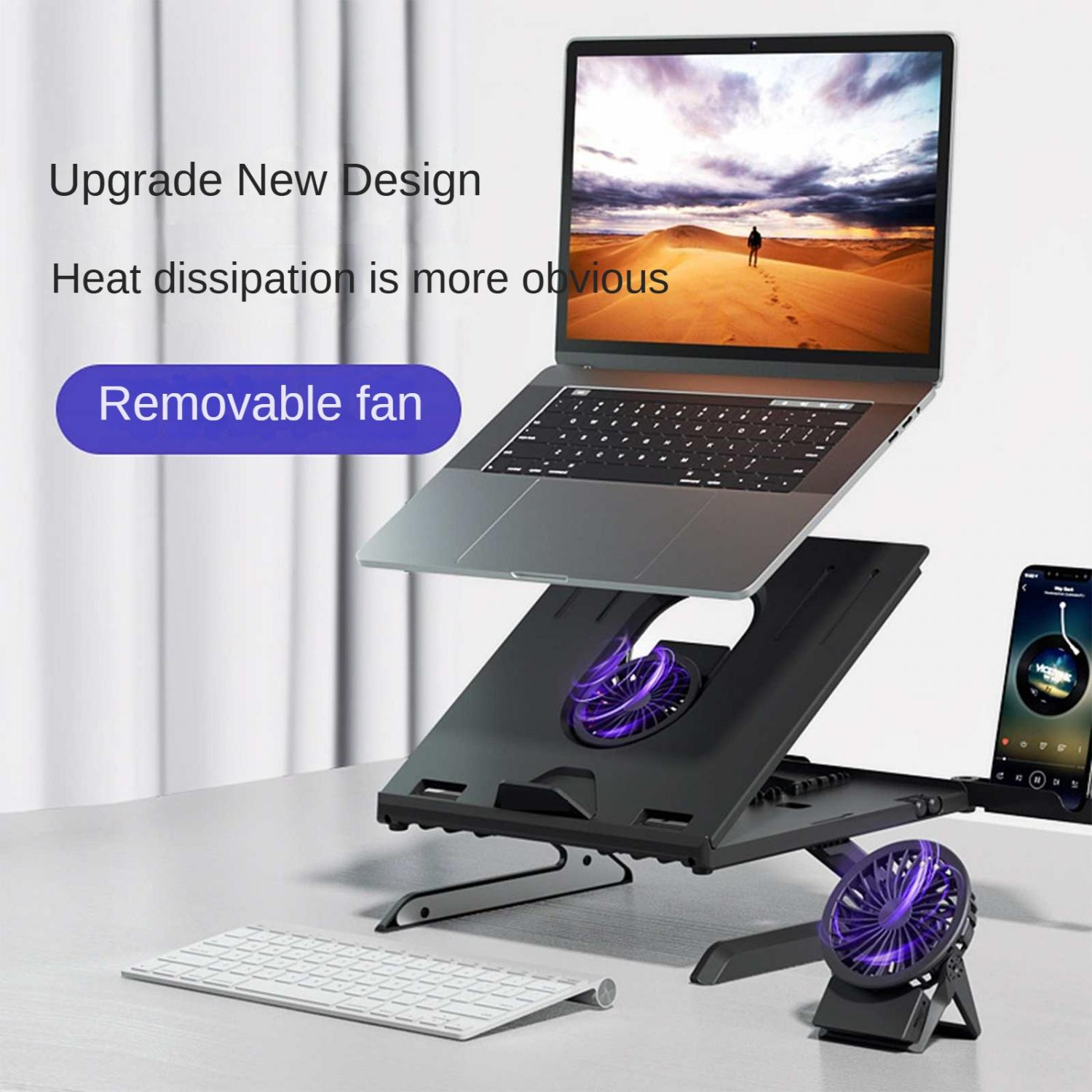 Ein Laptopständer mit zwei Lüftern, Tastatur, Handy und Laptop.