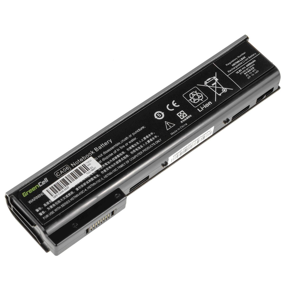 Czarny akumulator do laptopa z etykietami i ostrzeżeniami.