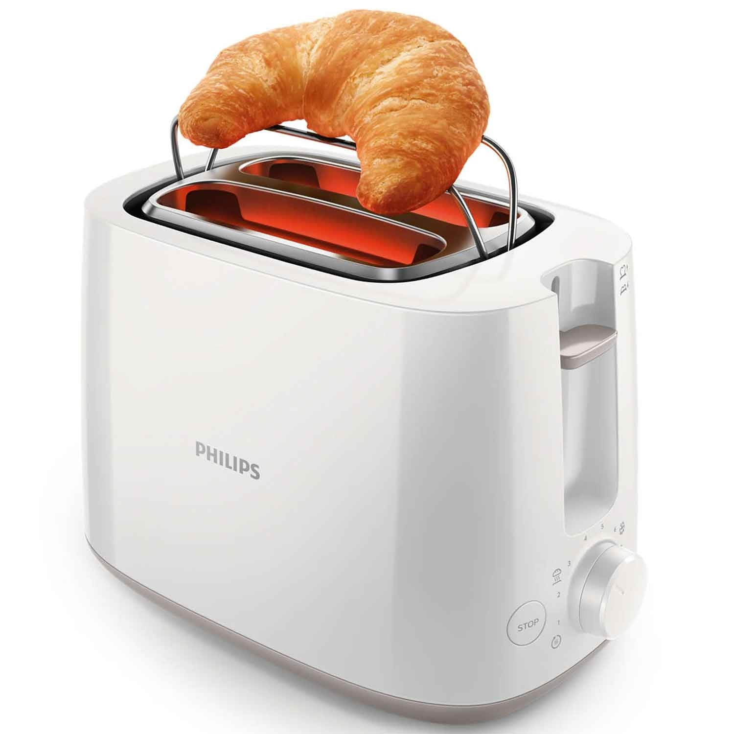 Een witte Philips toaster met een croissant die erin geroosterd wordt.