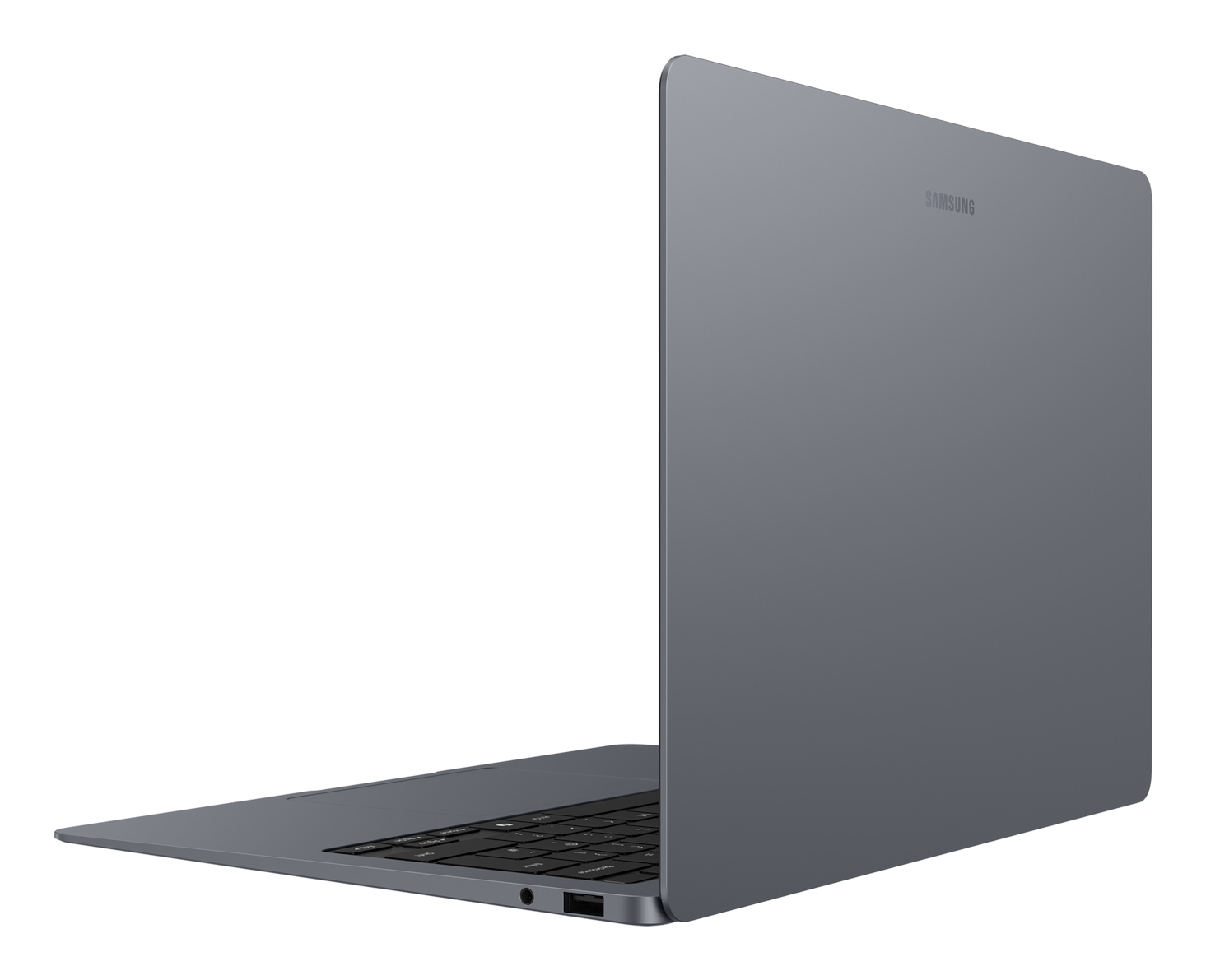 Un laptop Samsung grigio con tastiera e porte è aperto.