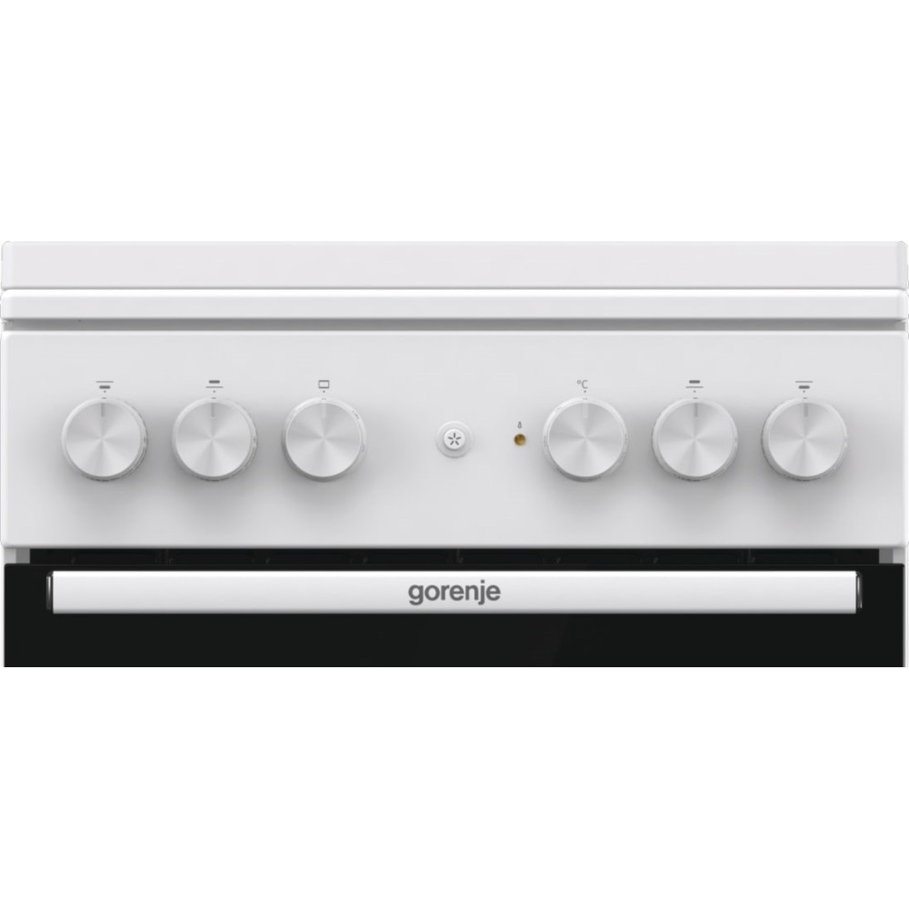 Biały piekarnik z pięcioma srebrnymi pokrętłami i czarnymi szklanymi drzwiami z logo Gorenje.