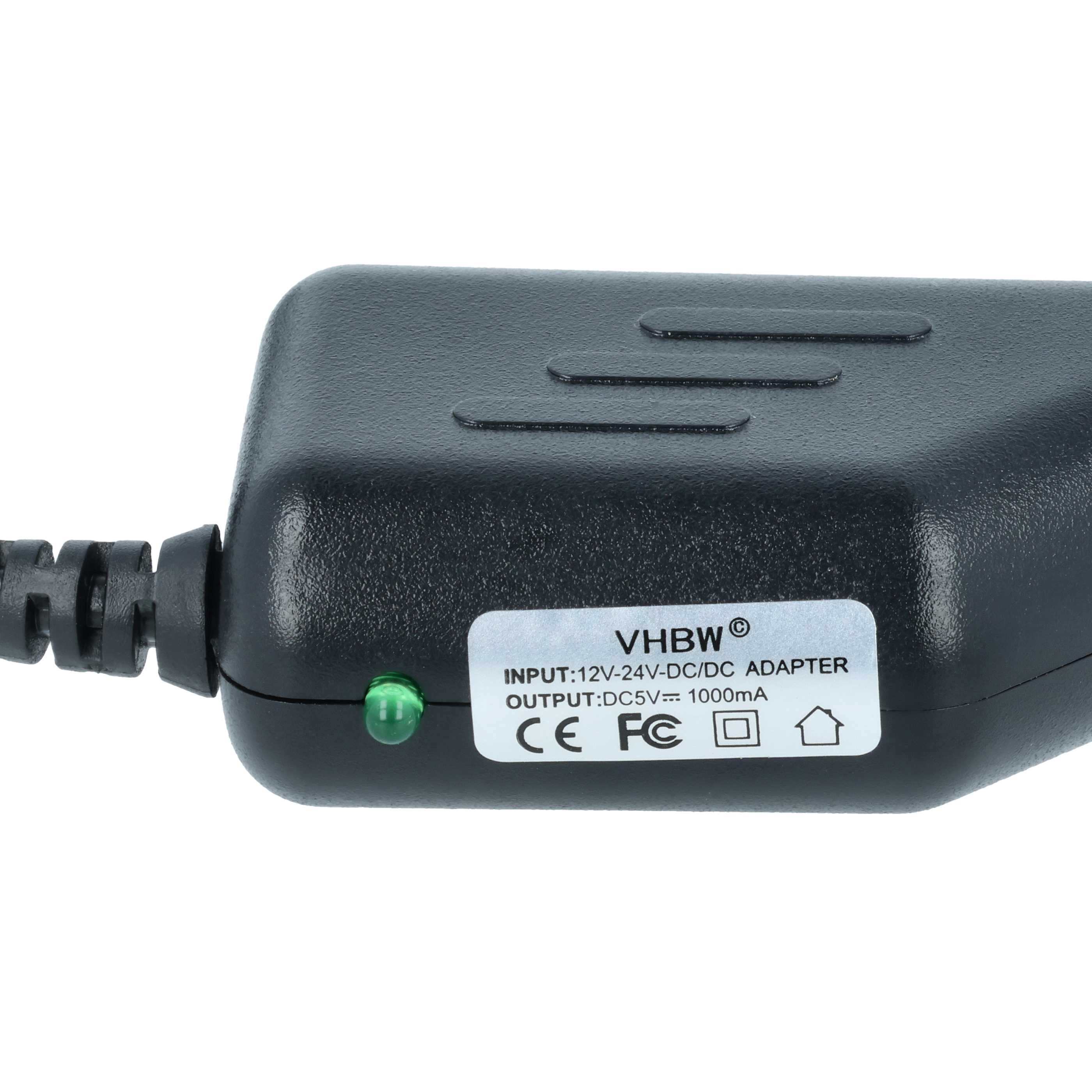 Schwarzer DC/DC-Adapter mit grünem Lämpchen und CE/FC-Siegeln.