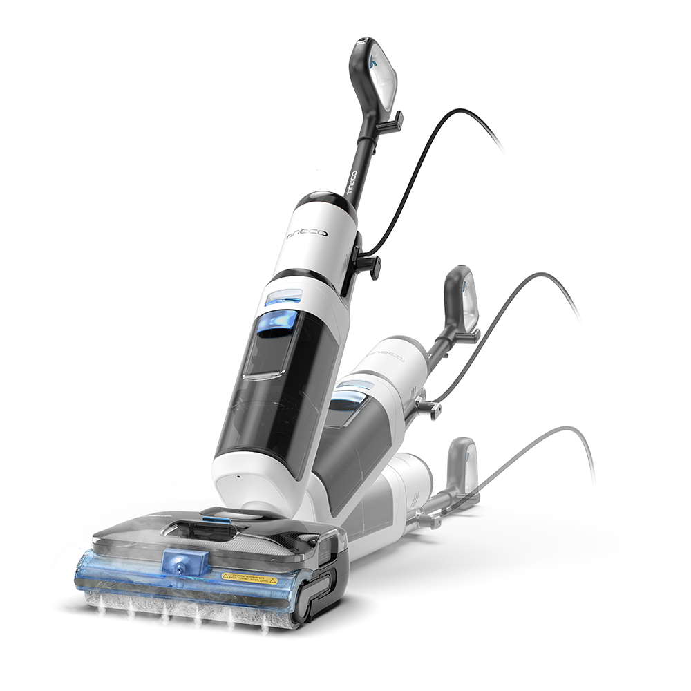 Biało-czarny odkurzacz do pracy na mokro i sucho z głowicą szczotkową na białym tle.