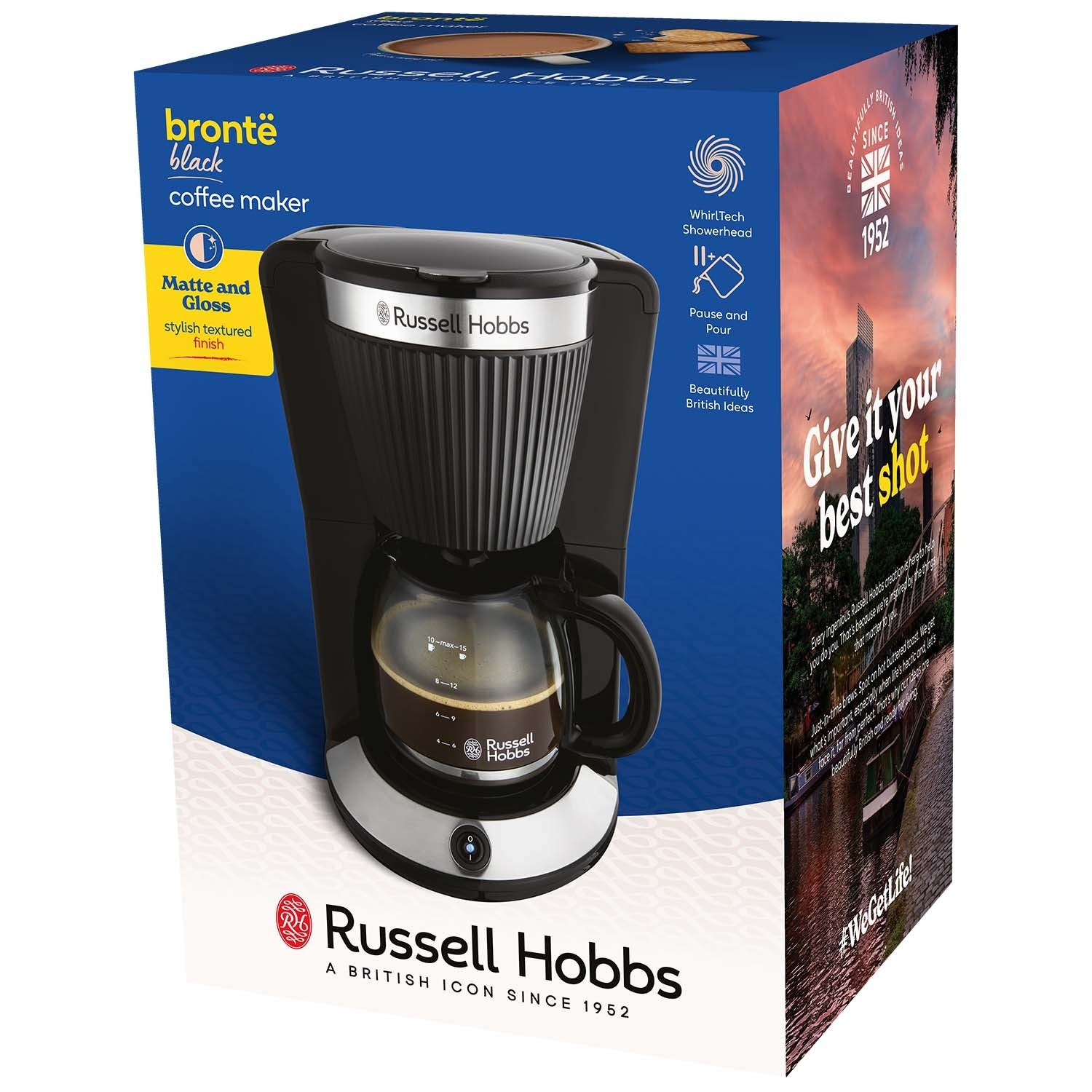 Una cafetera Russell Hobbs negra con jarra de cristal, en su embalaje.