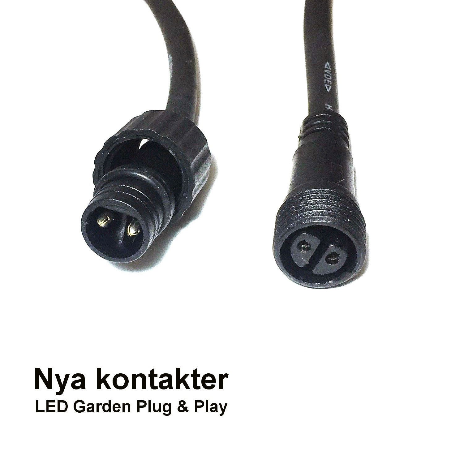 Twee zwarte connectoren met twee pinnen, één met kabel.