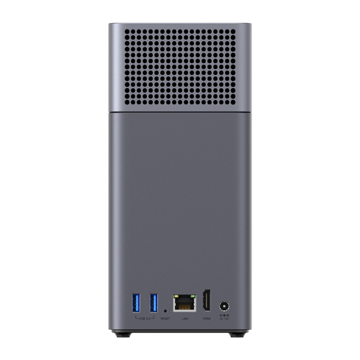 Tył szarego urządzenia z otworami wentylacyjnymi na górze i portami na dole.