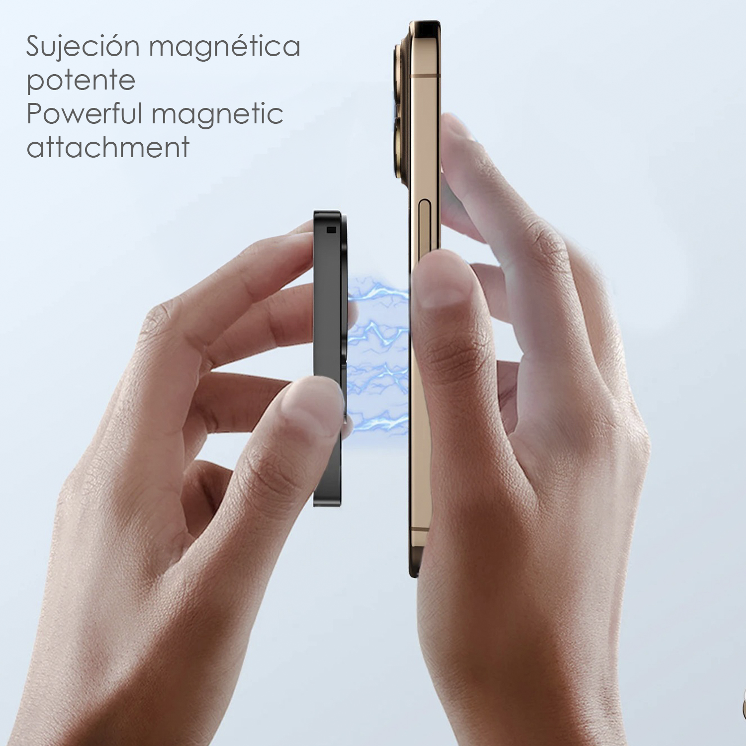 Mani tengono oggetto nero e telefono dorato, forza magnetica mostrata.