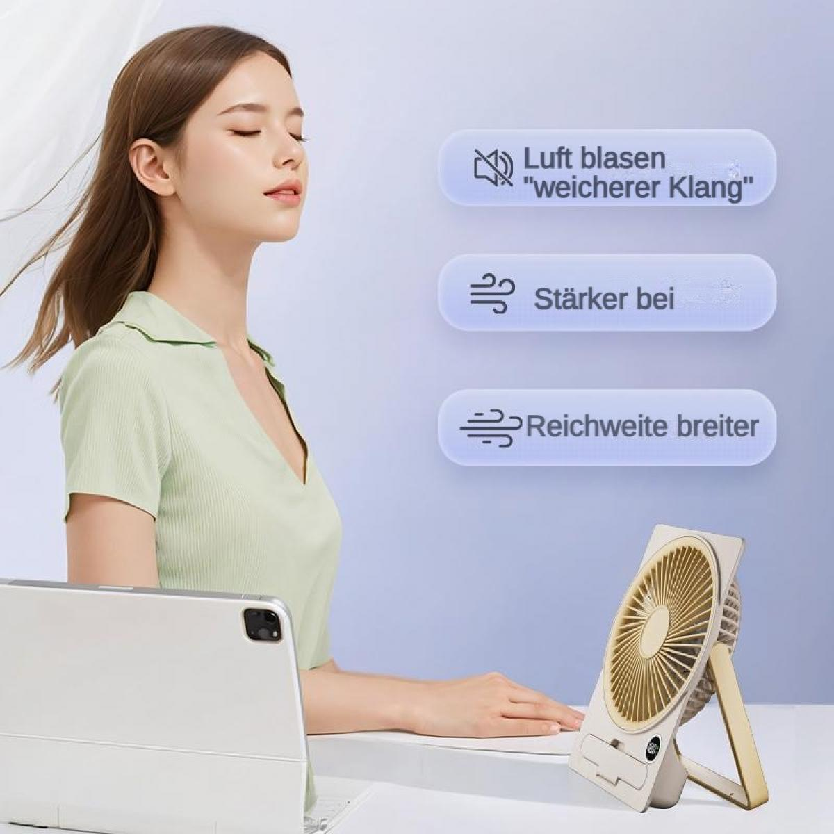 Frau sitzt am Schreibtisch, vor ihr ein kleiner Ventilator und ein Tablet.