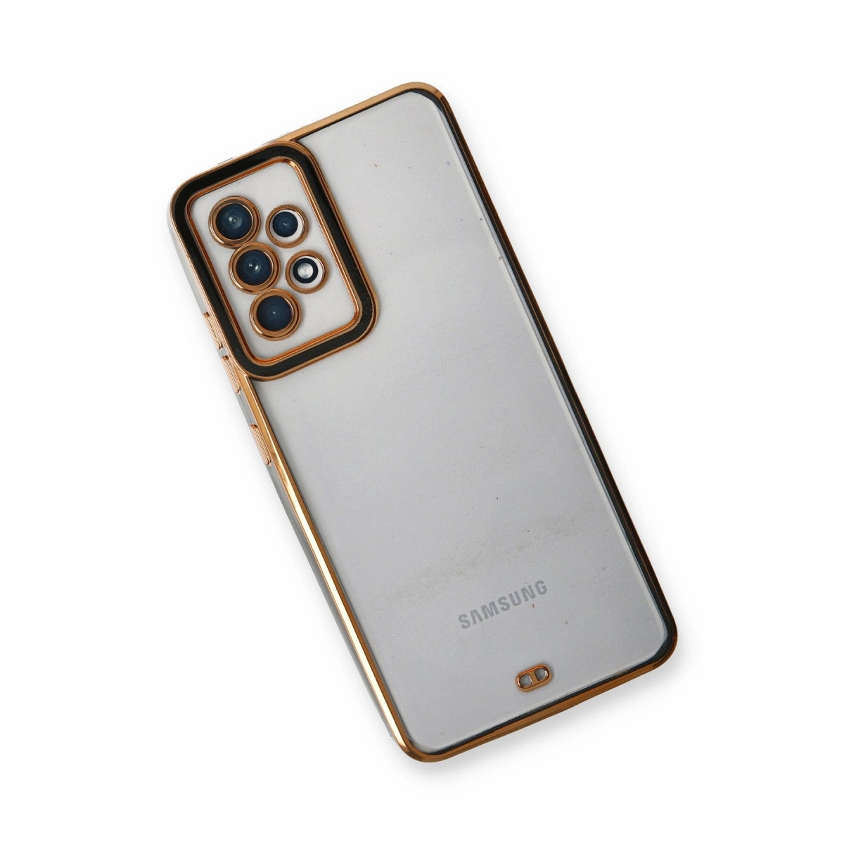 Altın çerçeveli ve kamera modüllü şeffaf telefon kılıfı.