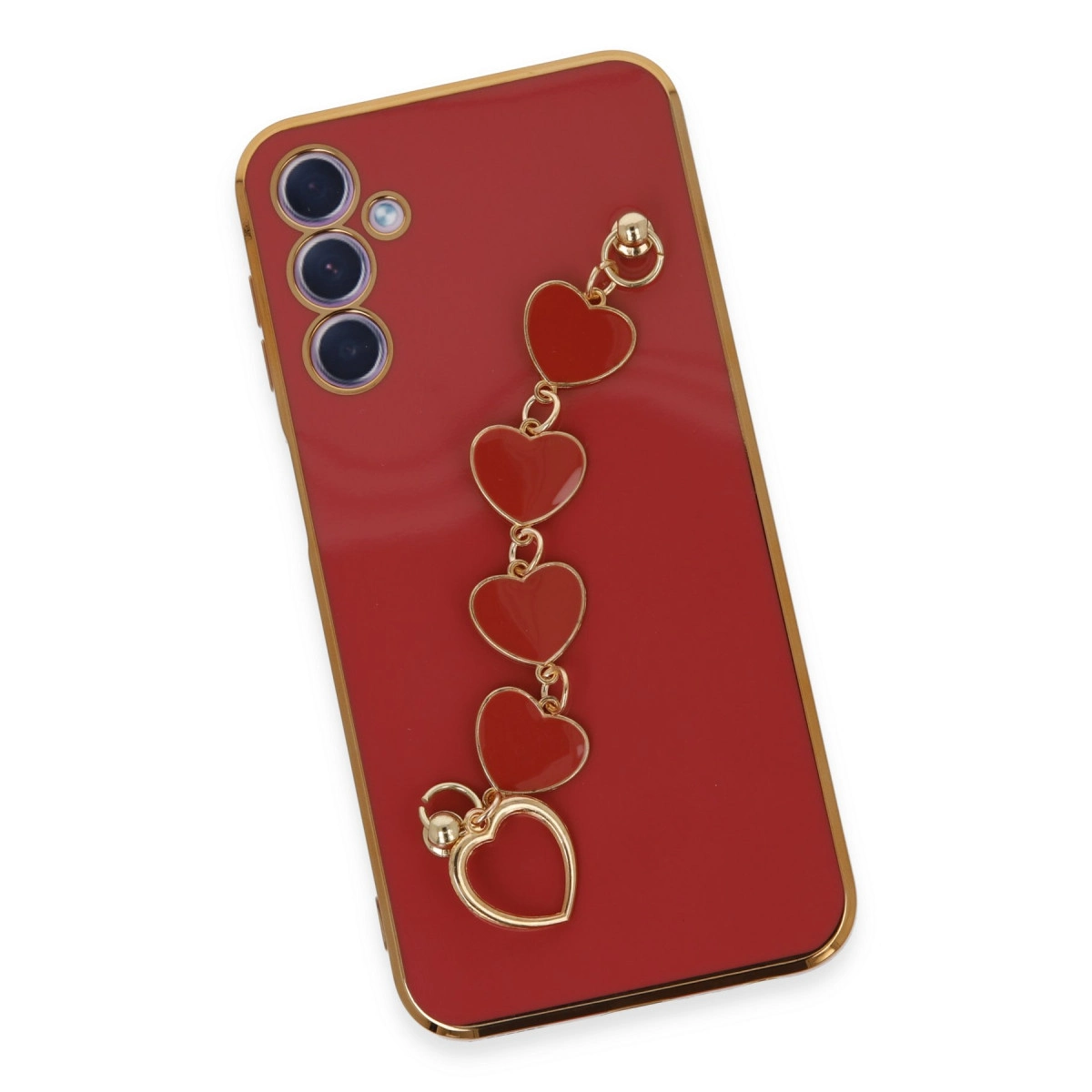 Altın kenarlı kırmızı telefon kılıfı ve kalp şeklinde takı zinciri.