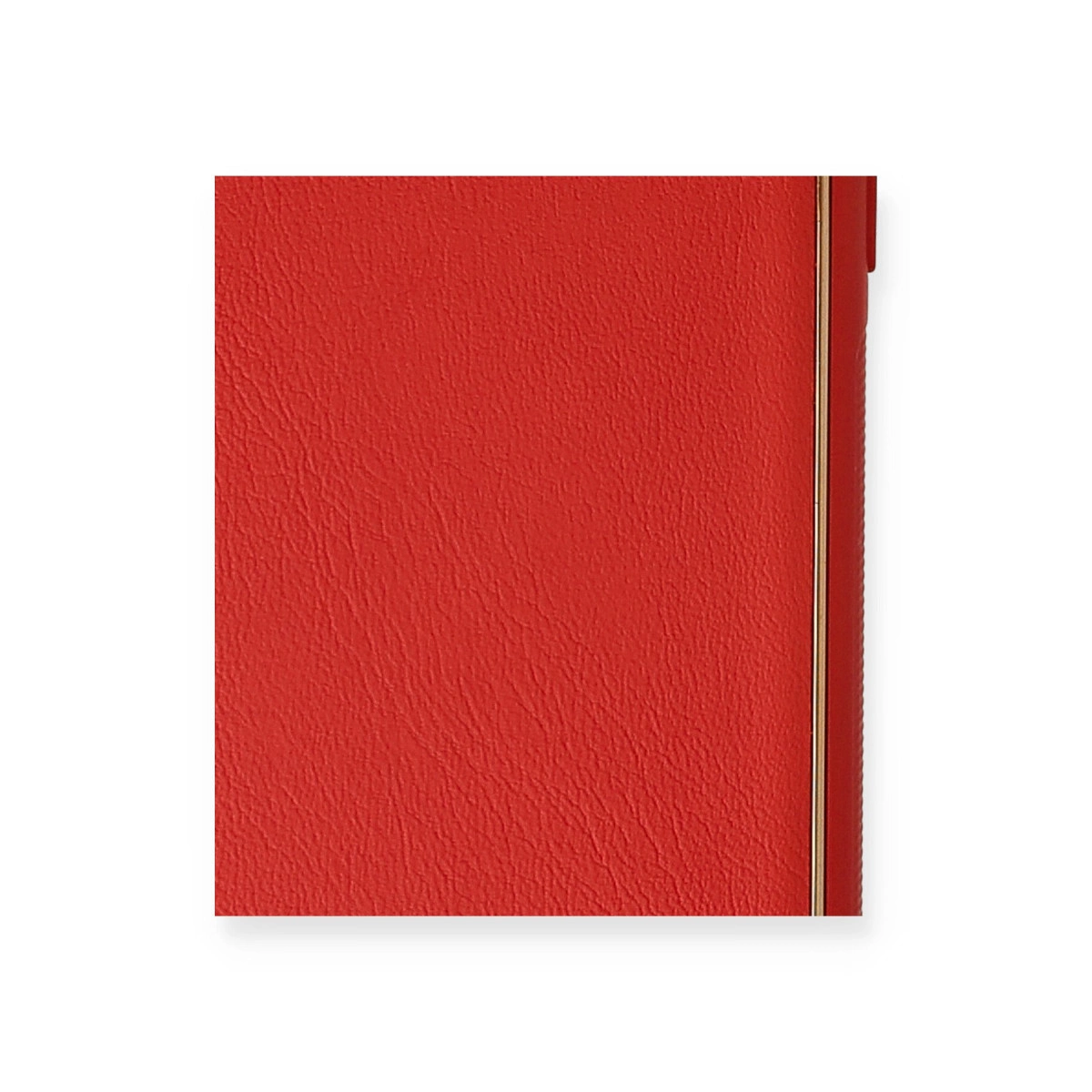 Altın kenarlı kırmızı defter.