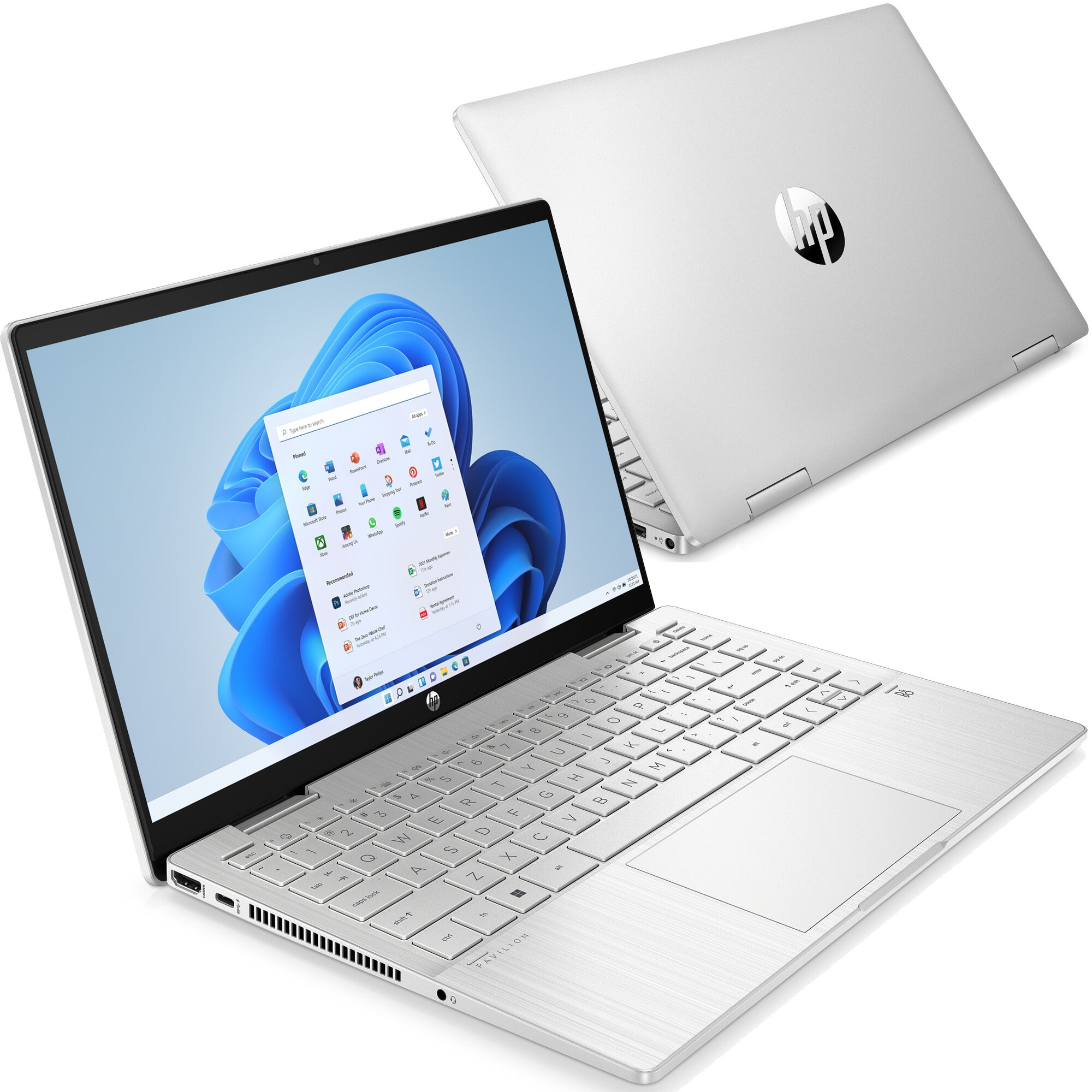 Otwarty srebrny laptop HP z menu startowym Windows 11 i klawiaturą.
