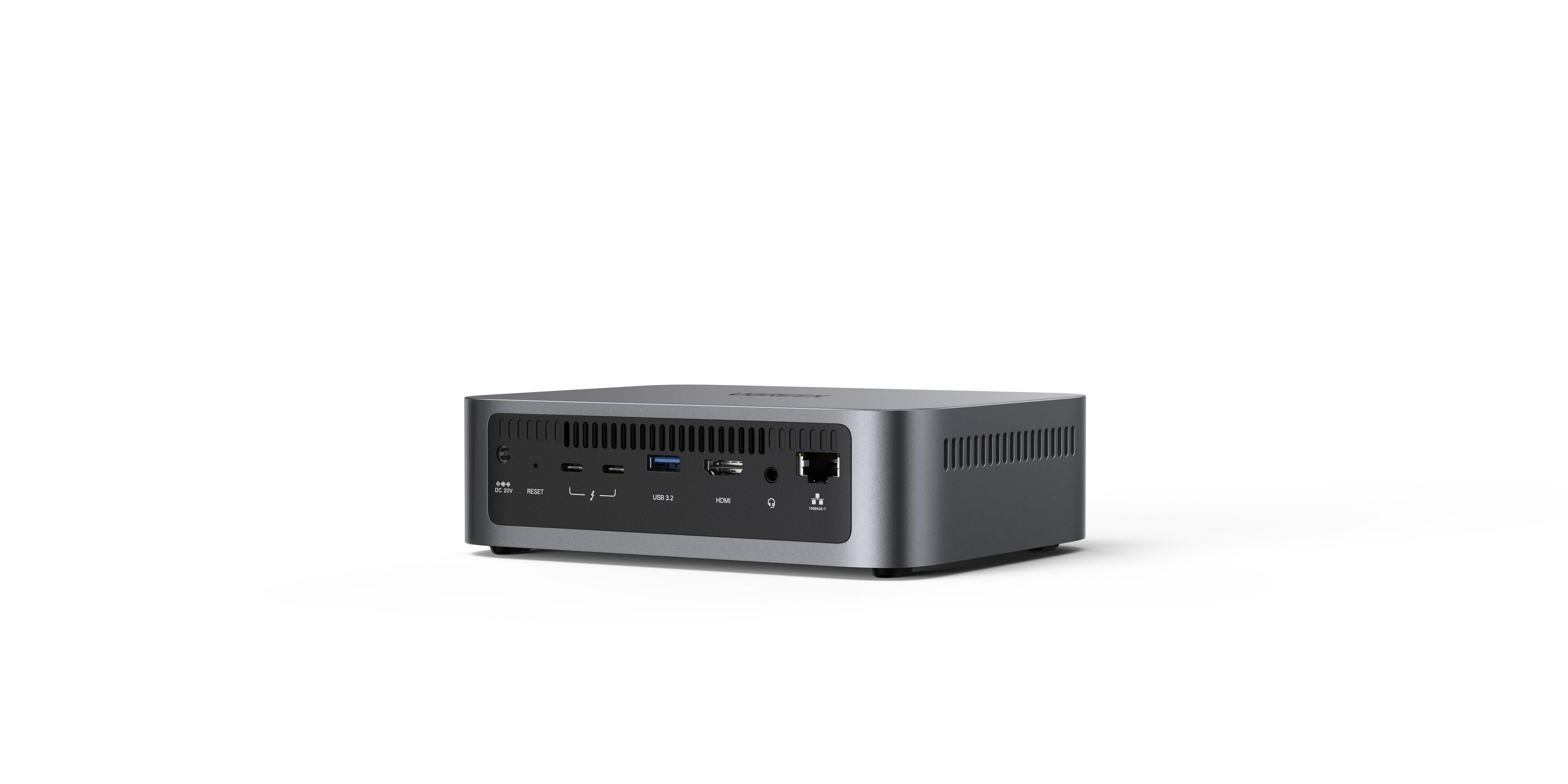 Szary mini PC z portami: DC 20V, Reset, USB 3.2, HDMI, słuchawki, LAN.
