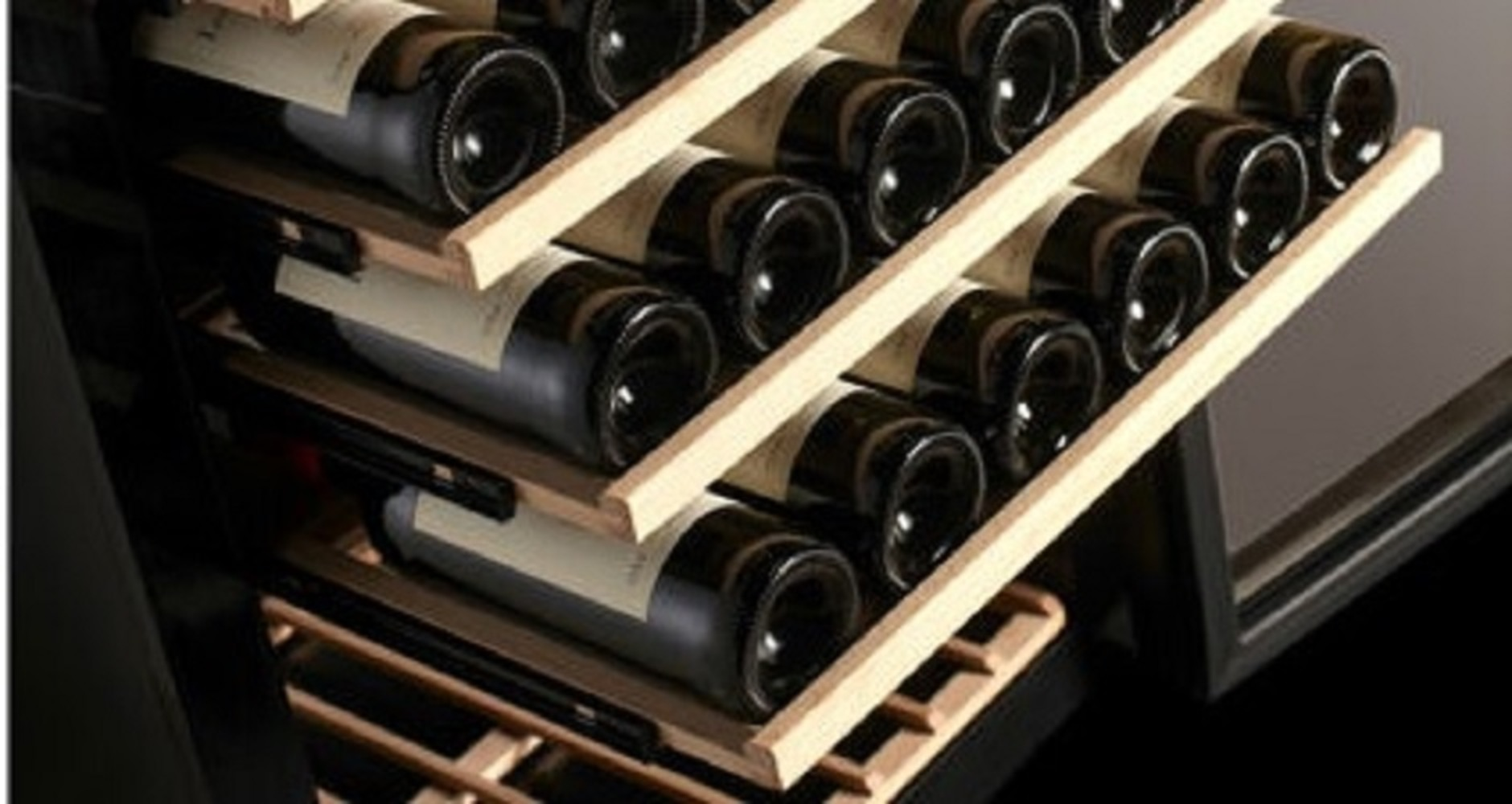 Wine fridge with multiple shelves filled with dark wine bottles.