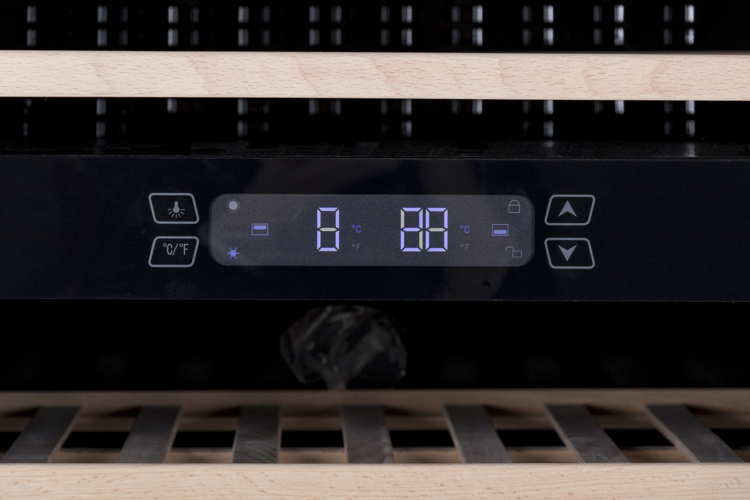 Digital display with buttons for temperature and light. Wooden shelves.