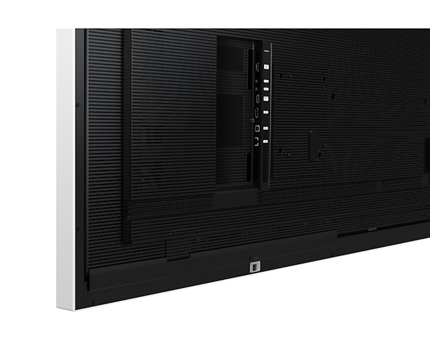 Back of a large black screen showing vents and ports. White frame on left.