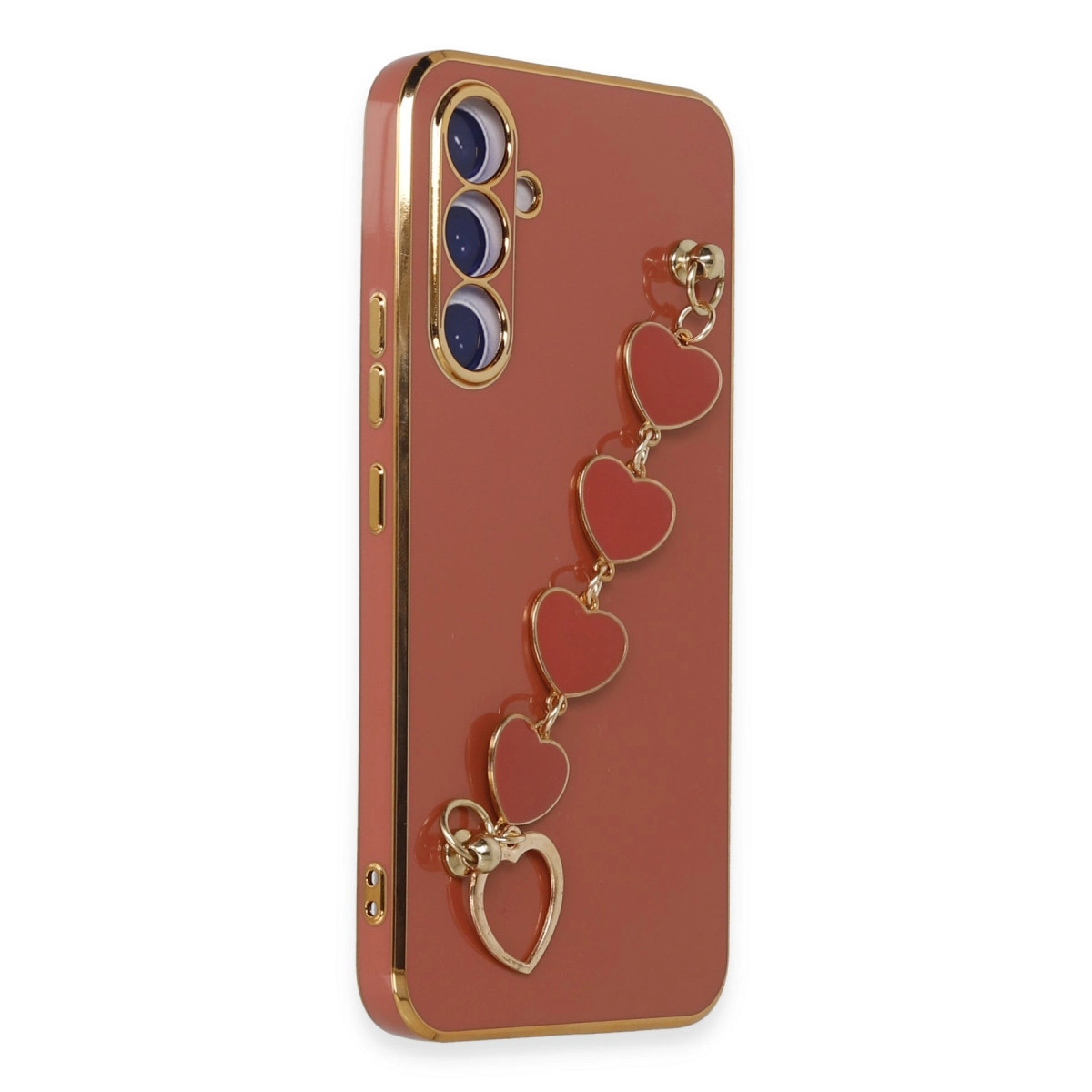 Kalp şeklinde takılar ve altın çerçeveli pembe telefon kılıfı.