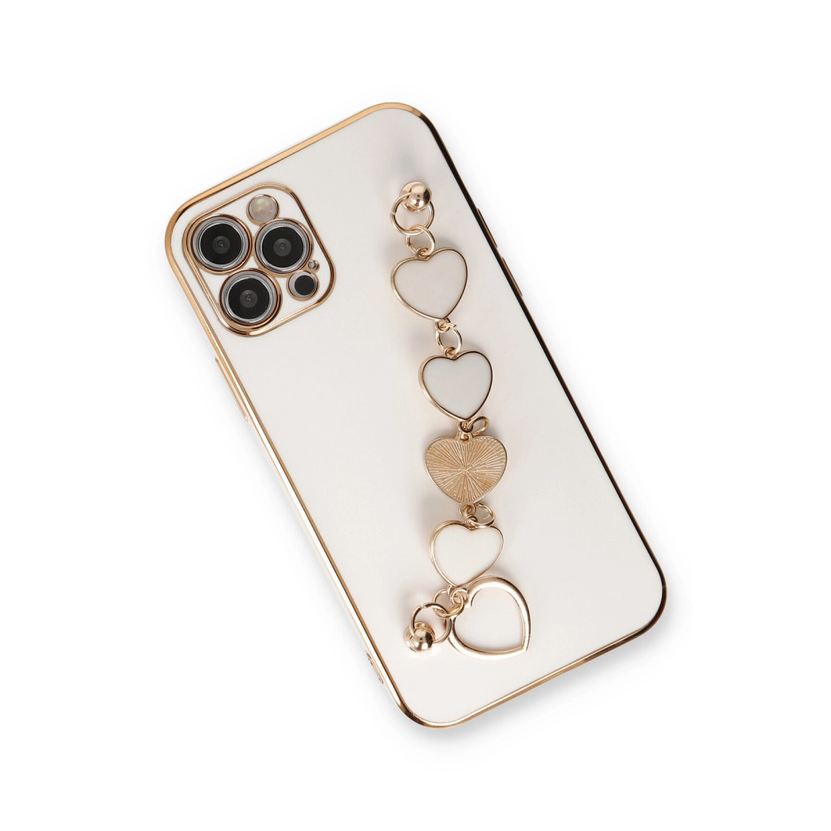 Altın kenarlı beyaz telefon ve kalp şeklinde charm zinciri.