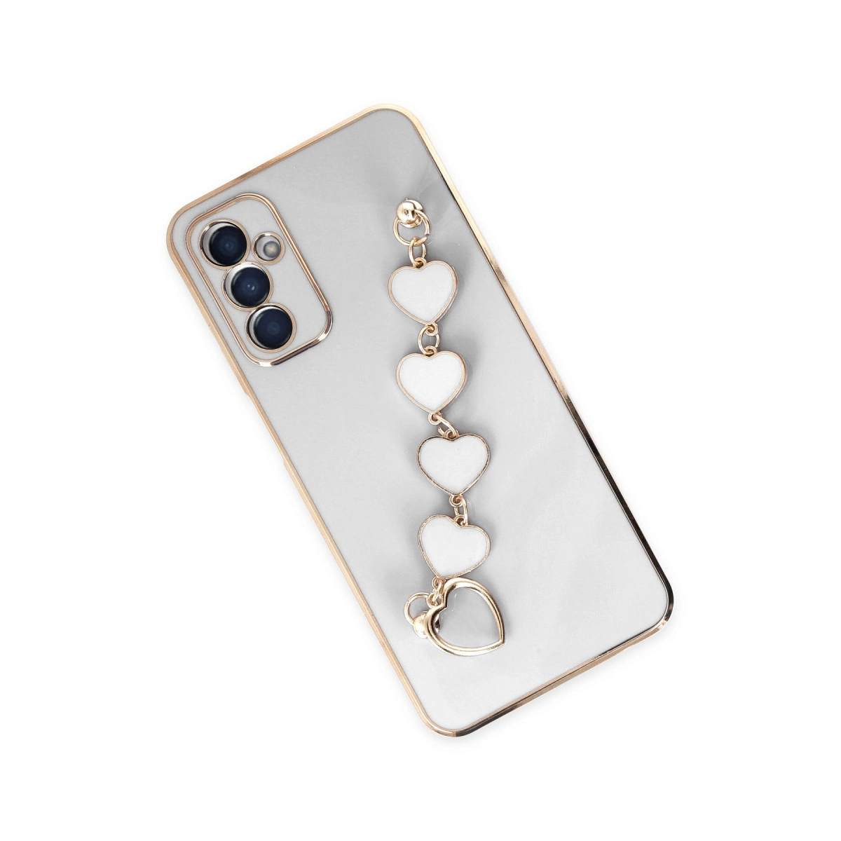 Altın kenarlı ve kalp şeklinde takı sallantılı açık gri telefon.