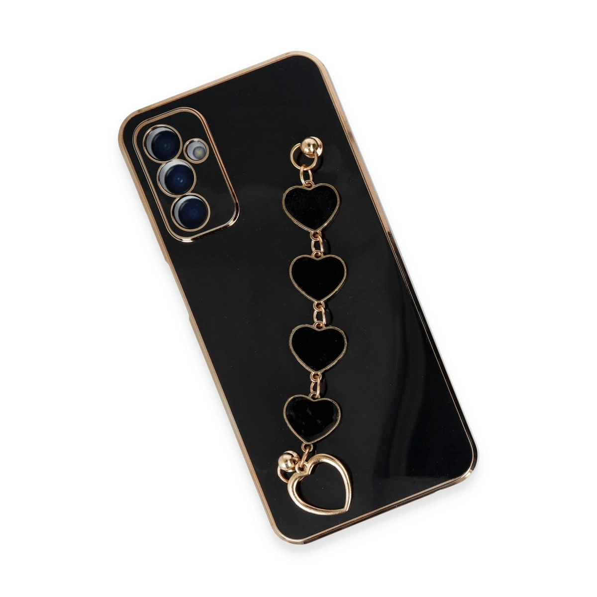 Altın kenarlı, kamera dizilimli, kalp charm kolyeli siyah telefon kılıfı.