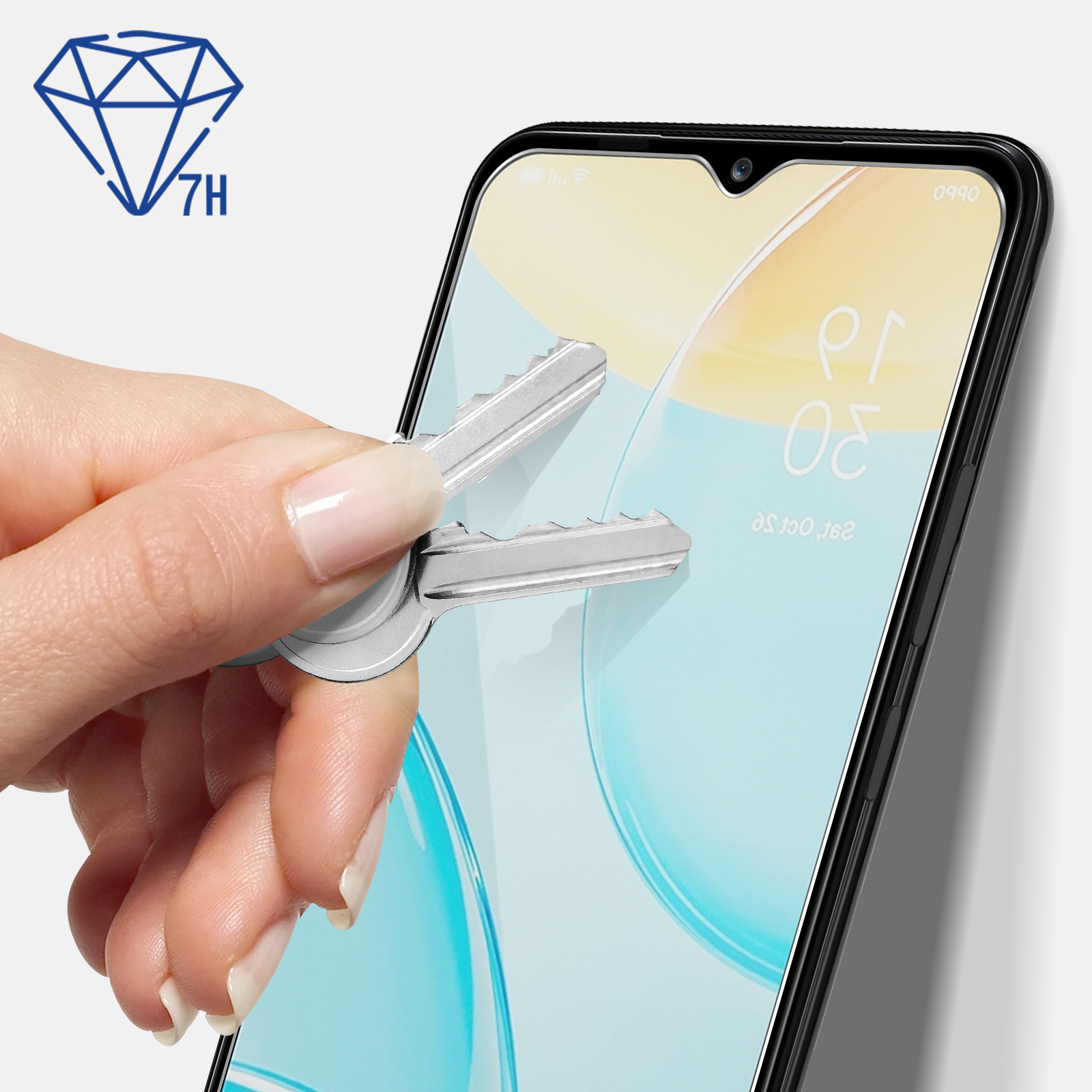 Un dito tiene due chiavi che graffiano lo schermo di un telefono. Logo Diamante 7H.