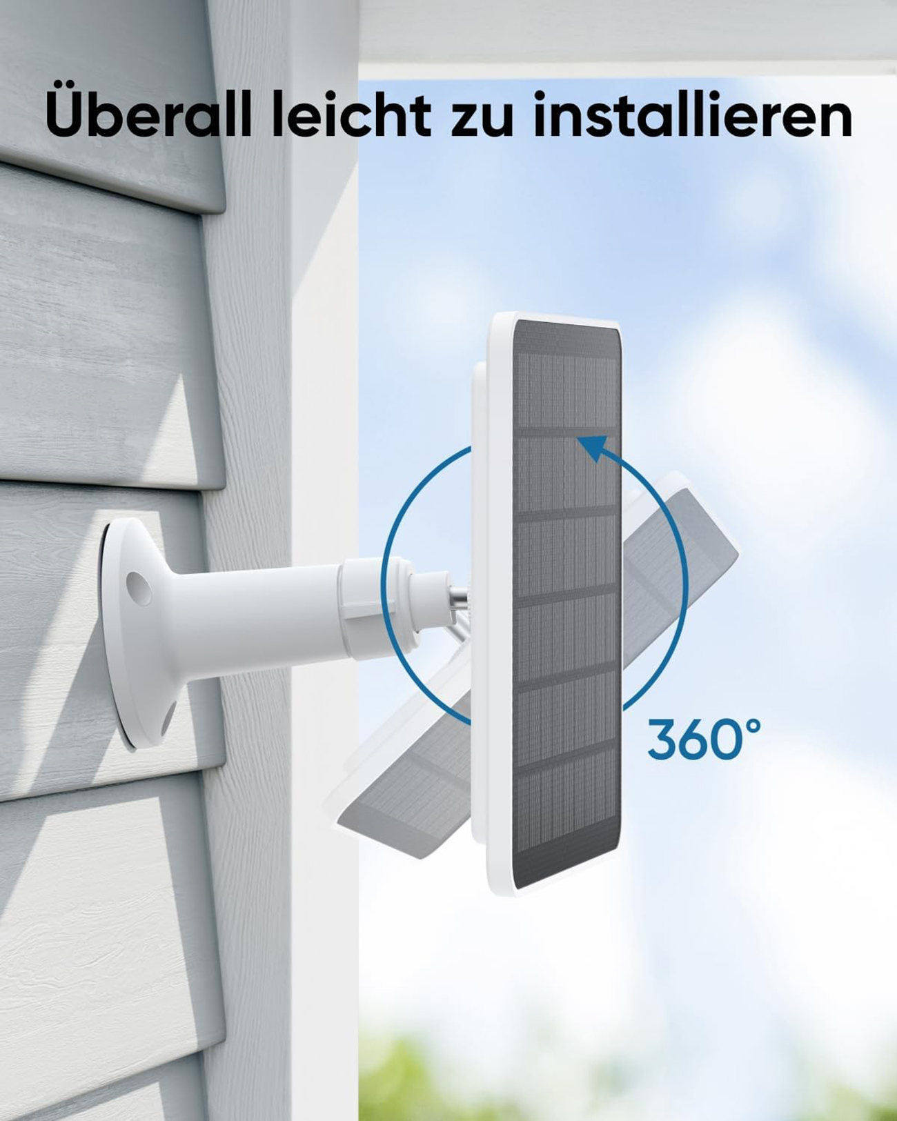 Biały panel słoneczny jest zamontowany na białym wsporniku na ścianie domu.