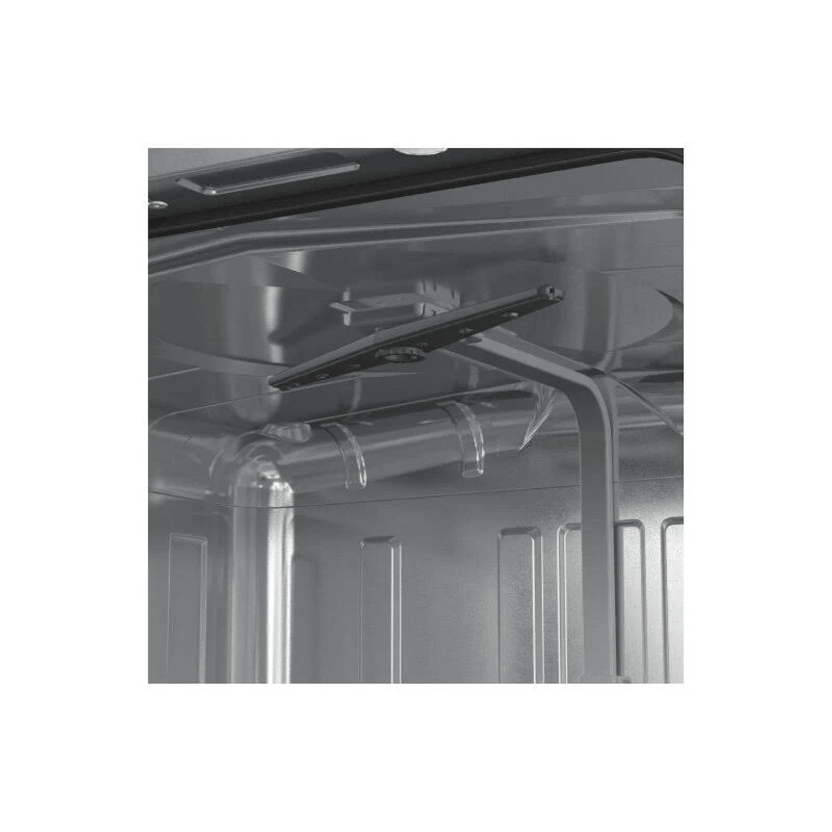 Wnętrze zmywarki z ramieniem natryskowym i dyszami wodnymi.