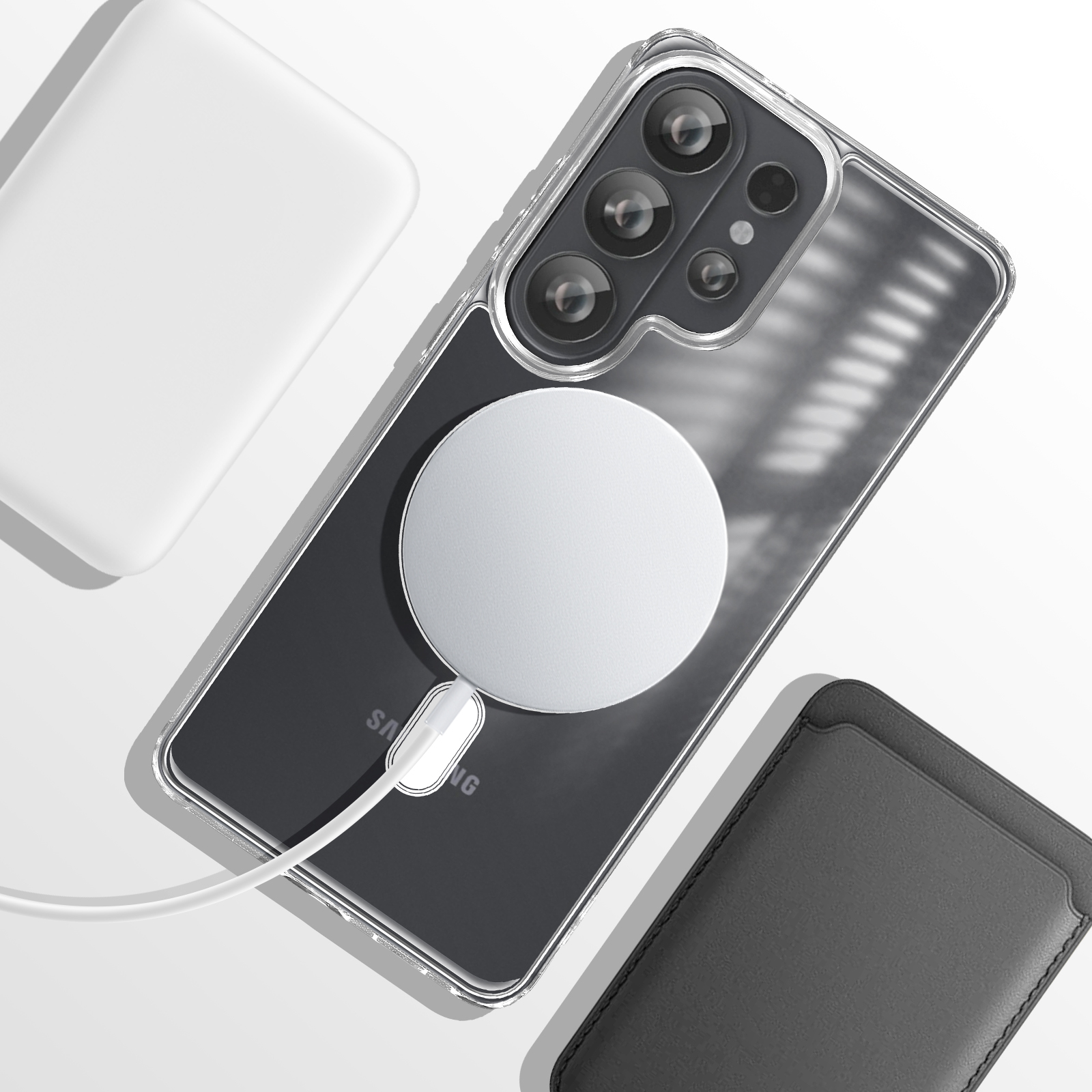 Uno smartphone in custodia trasparente, con caricabatterie magnetico e cavo bianco.