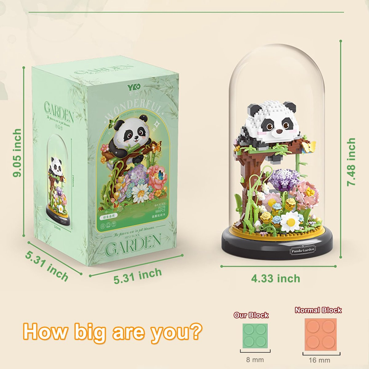 Ein Panda-Baustein-Set mit Blumen unter einer Glasglocke, daneben die Verpackung.