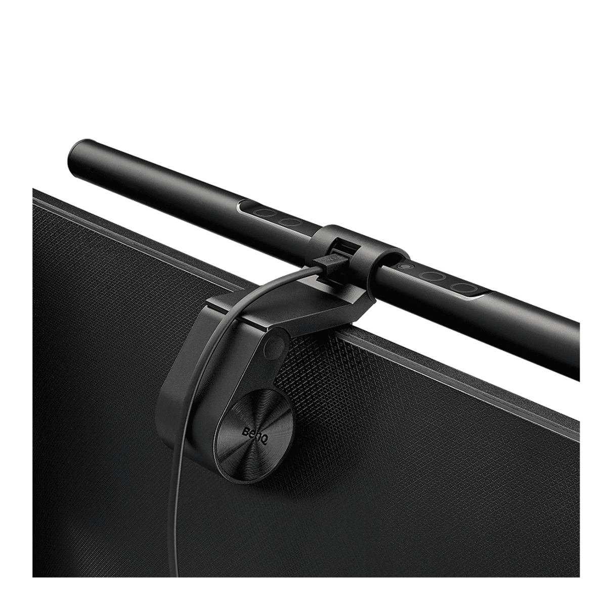 A black monitor light bar is mounted on a black screen.