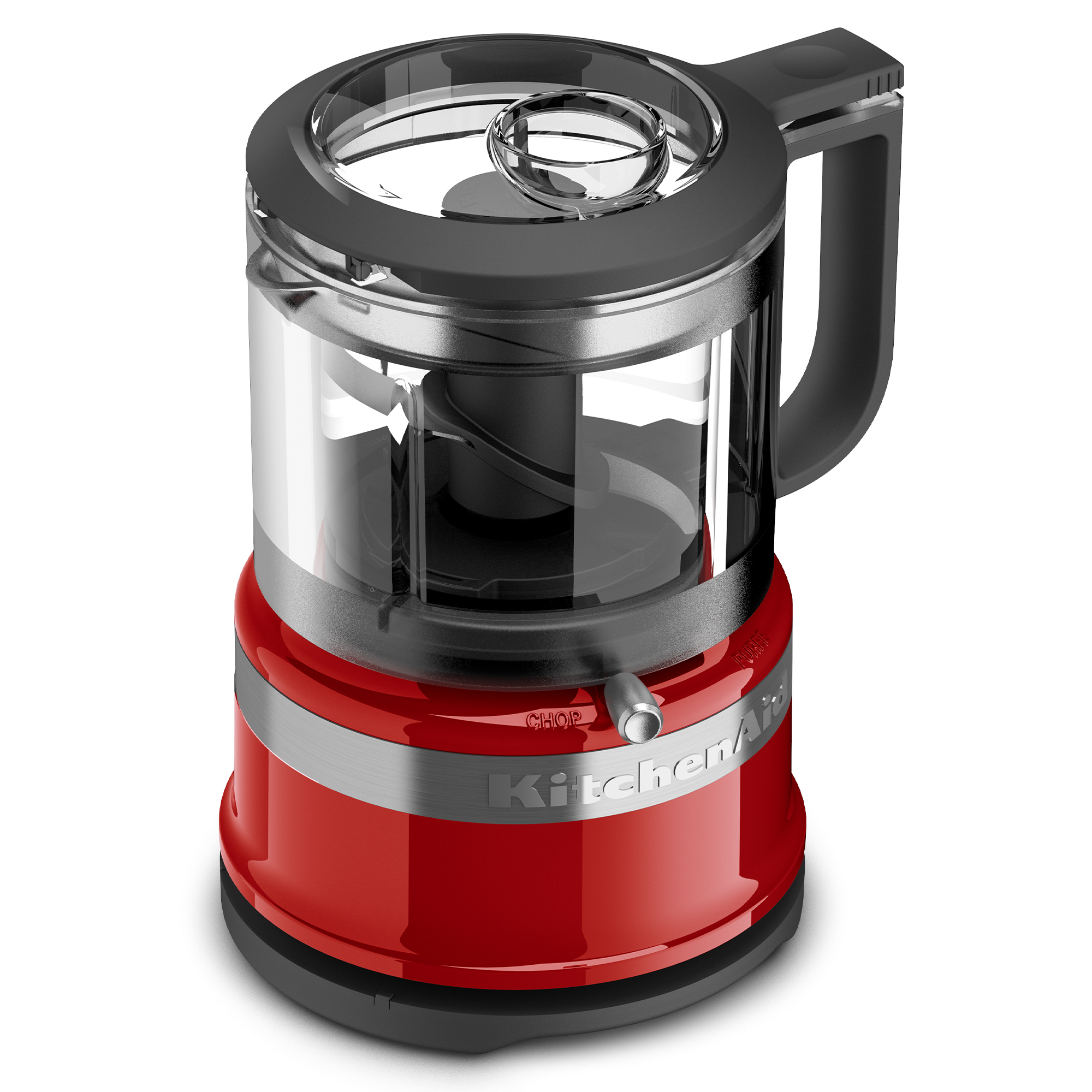 Ein roter KitchenAid Mini-Zerkleinerer mit Glasbehälter und schwarzem Deckel.