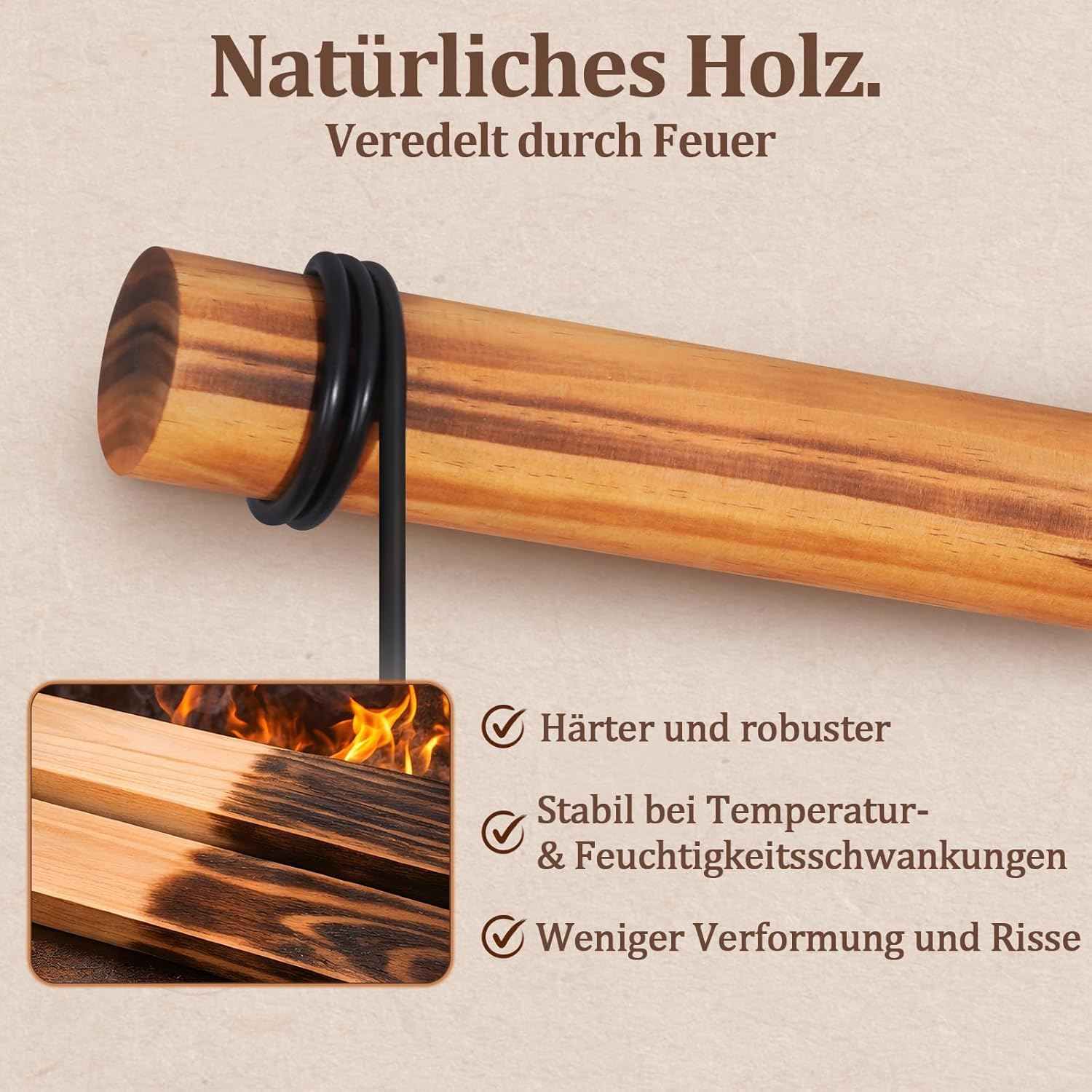 Asta di legno con anelli neri e pezzi di legno trattati a fuoco.