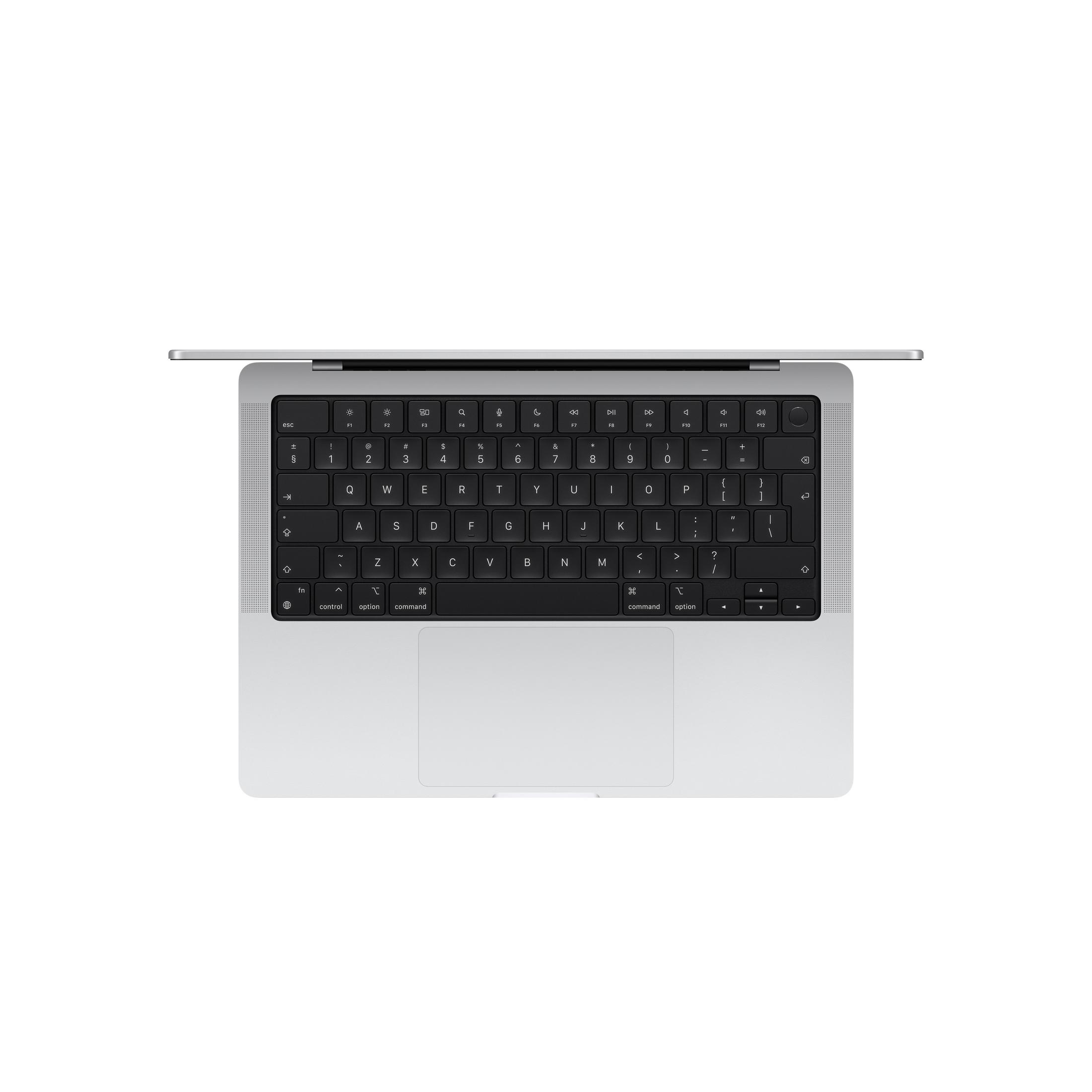 Un clavier d'ordinateur portable argenté avec des lettres noires sur fond blanc.
